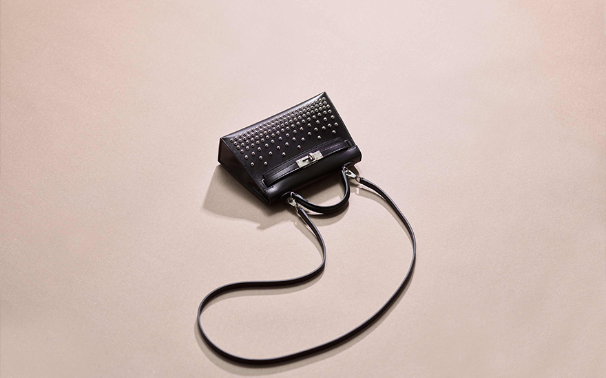 A limited-edition black calf box leather cloute Mini Kelly 20 II with palladium hardware, Hermes, 2023, offered in Handbags & Accessories on 25 May 2024 at Christie's in Hong Kong