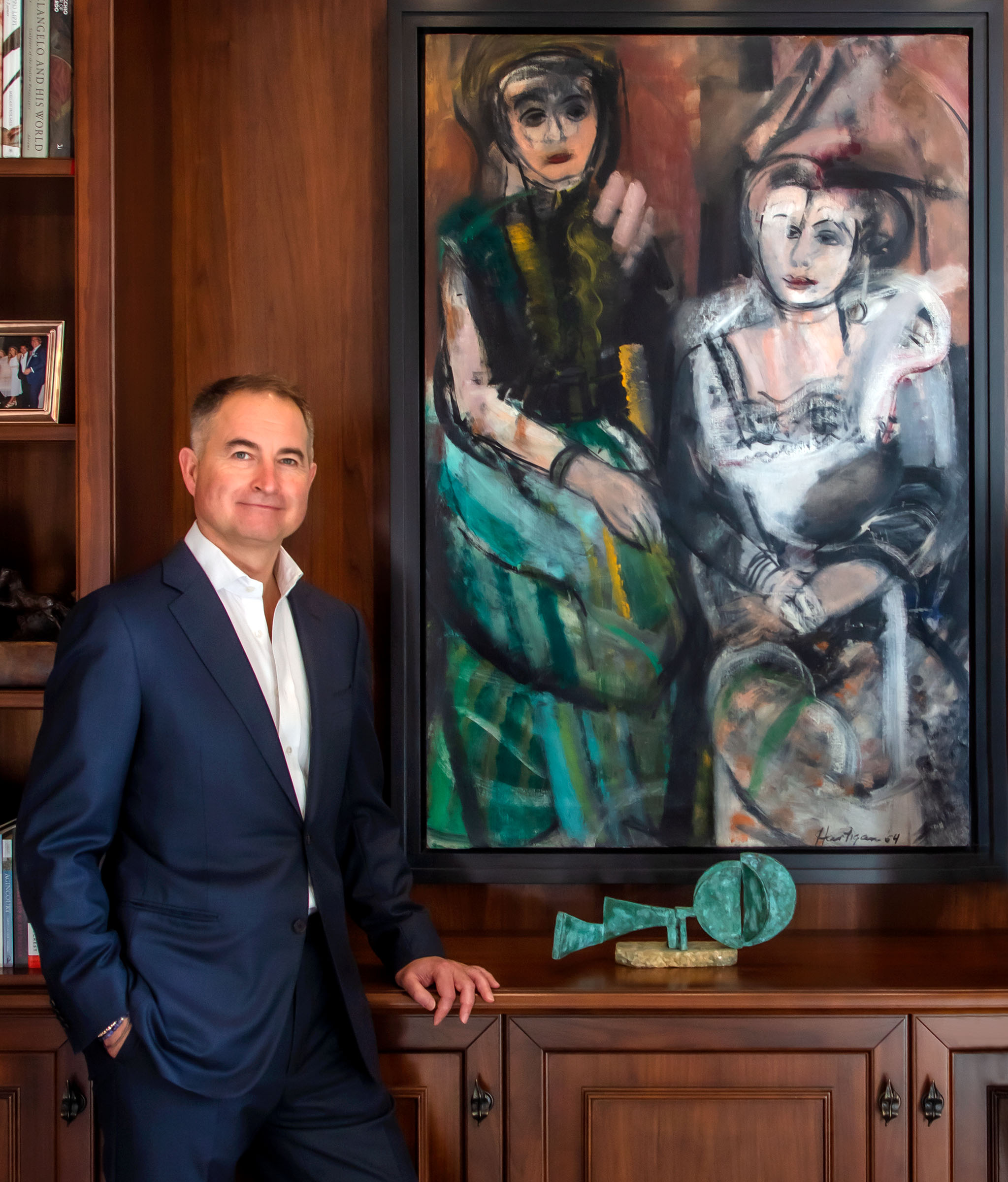 Christian Levett at home with Grace Hartigan's Two Women (Daisy and Olga) from 1954. On the sideboard is a 1964 bronze by Dorothy Dehner, Looking North (Green)