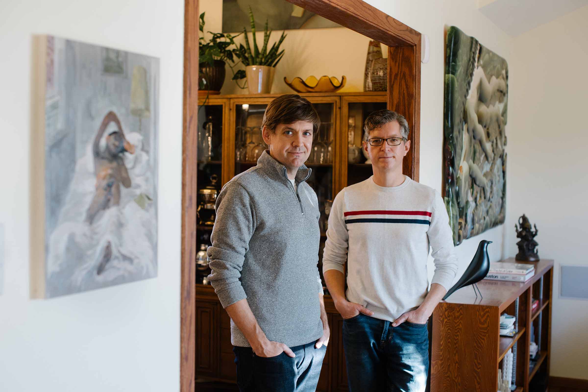 The Thomas-Suwalls at home with their collection in Minot. Photo by Mandi Carroll