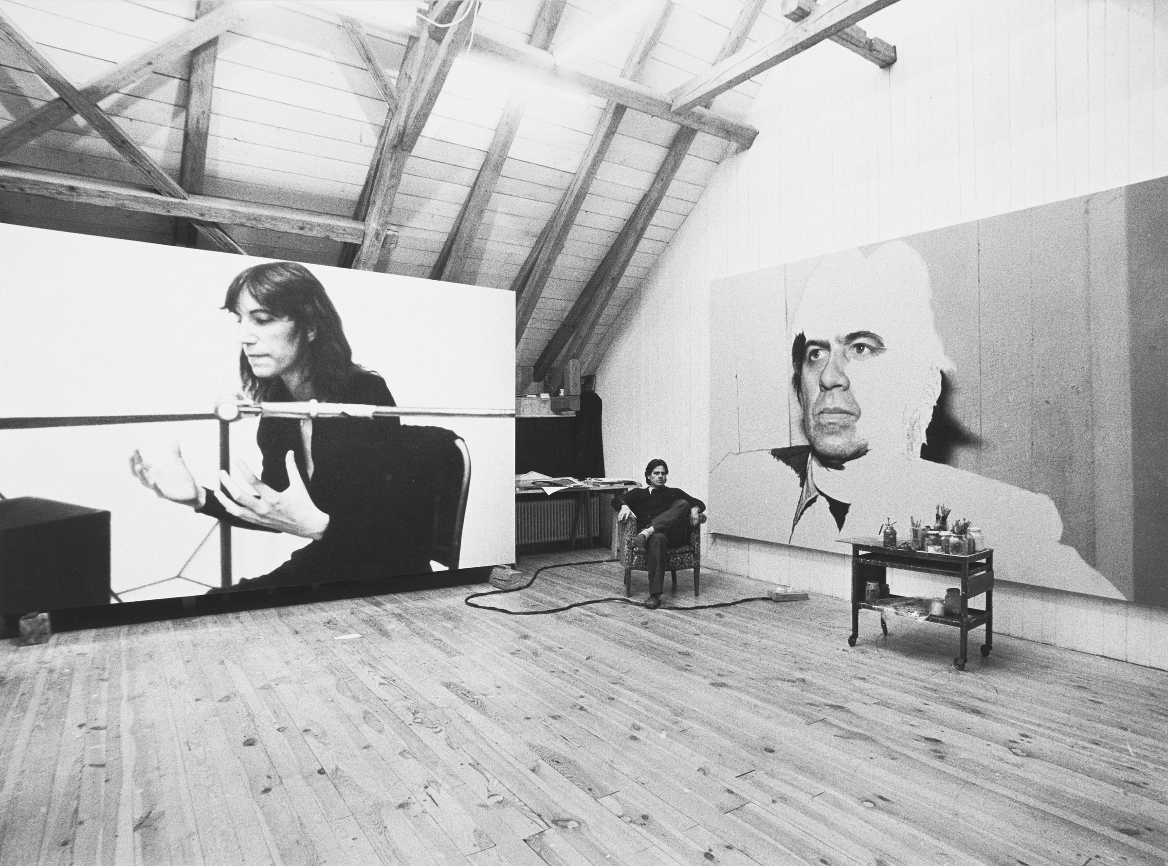Franz Gertsch in his studio with the unfinished Selbstbildnis (Self-Portrait), 1980, and Patti Smith V, 1979