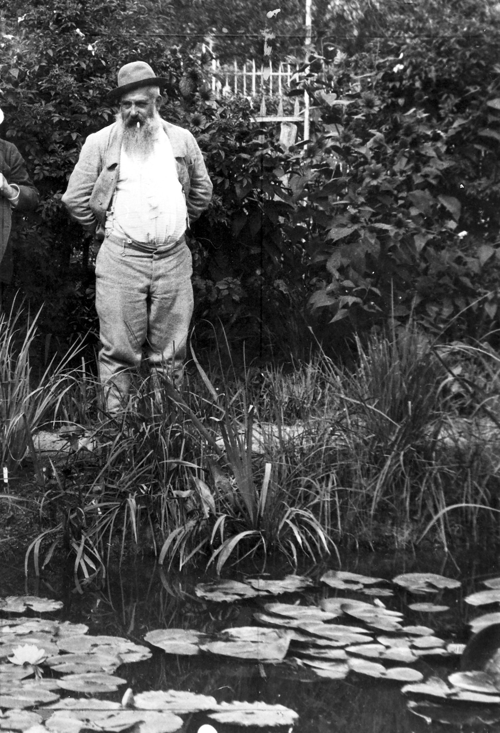 Claude Monet in his garden at Giverny