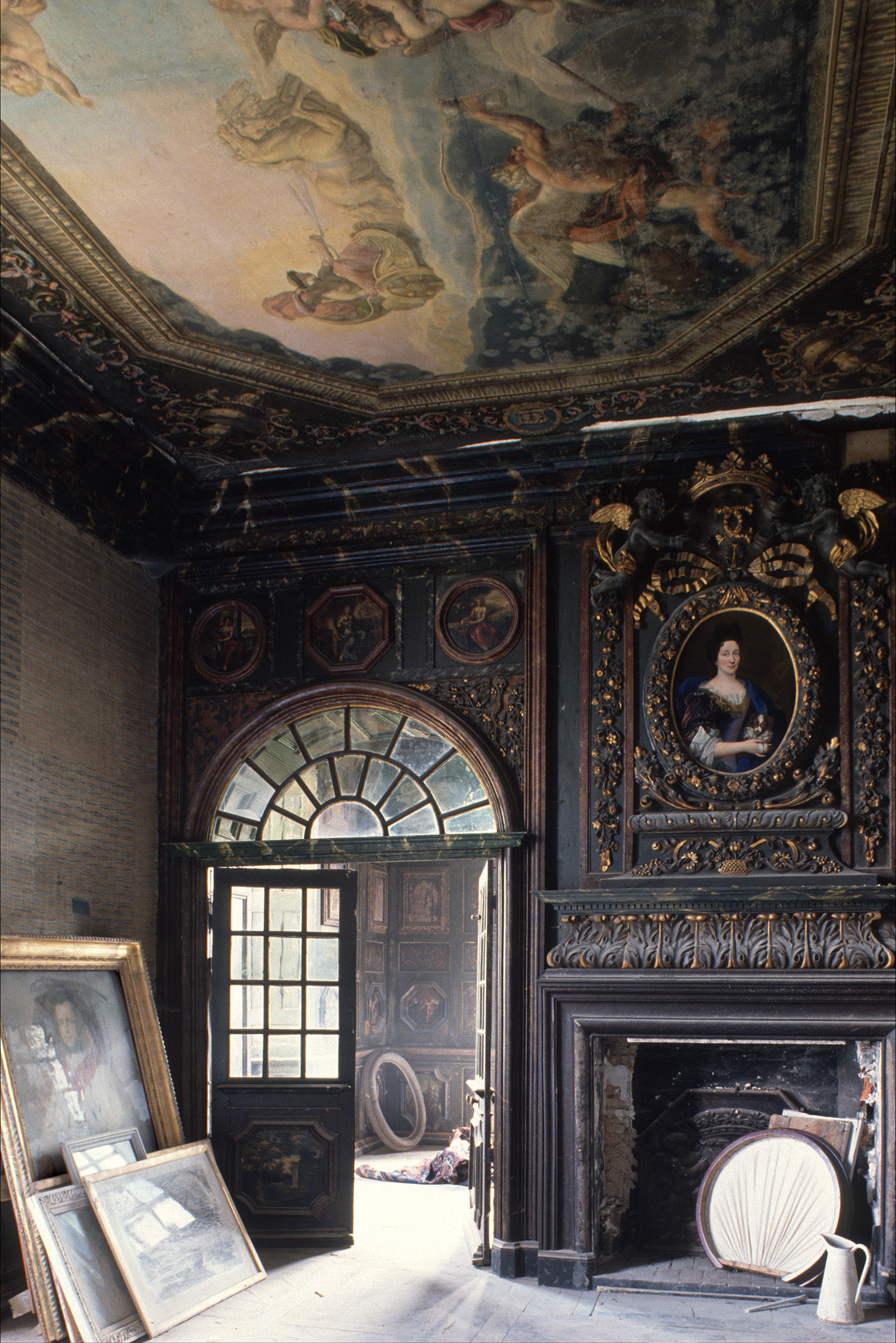 Italian artist Maurizio Cattelan's grand reception room, with ornately carved gilt panelling and a painted ceiling, is an ideal storage room for 'unwanted art'