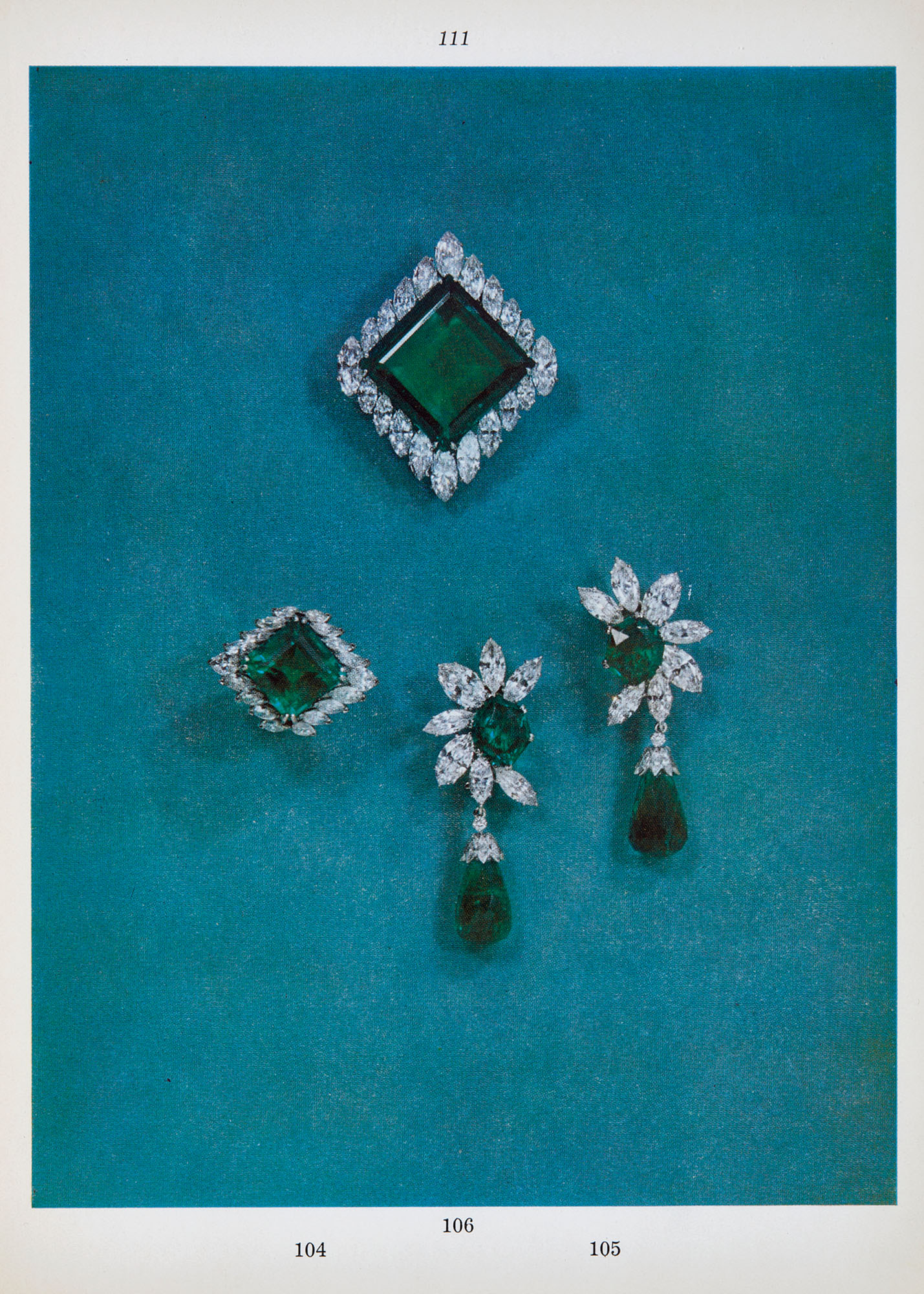 The sale cataloguing described the magnificent emerald and diamond clip brooch, composed of a superb square-cut emerald in a border of twenty navette-cut diamonds forming a fancy lozenge-shaped cluster, by Cartier, Paris - approximate weight of emerald 37.41 carats, and approximate total weight of diamonds 12.04 carats