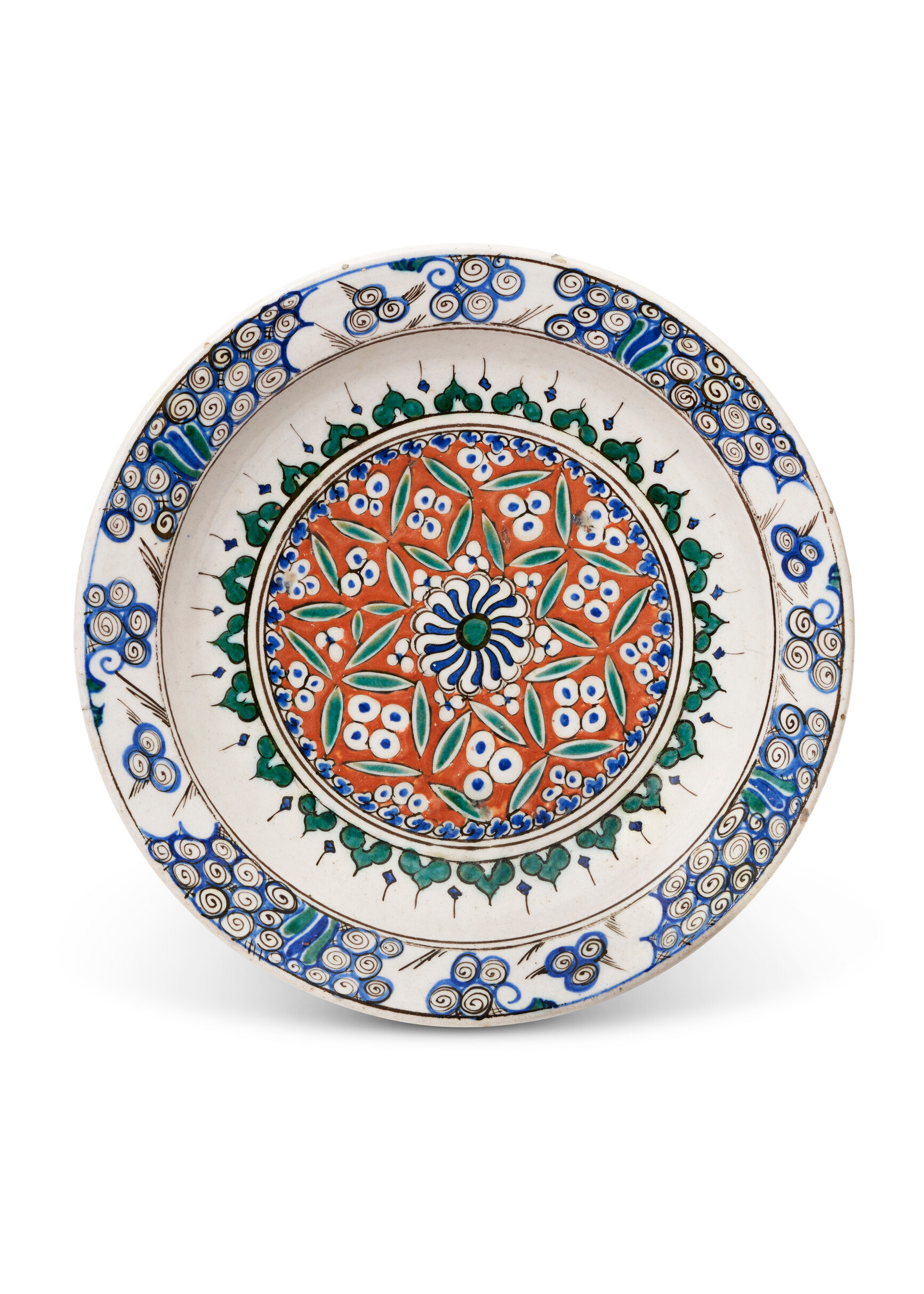An Iznik pottery dish, Ottoman turkey, circa 1580, offered in Art of the Islamic and Indian Worlds including Rugs and Carpets on 24 October 2024 at Christie's in London