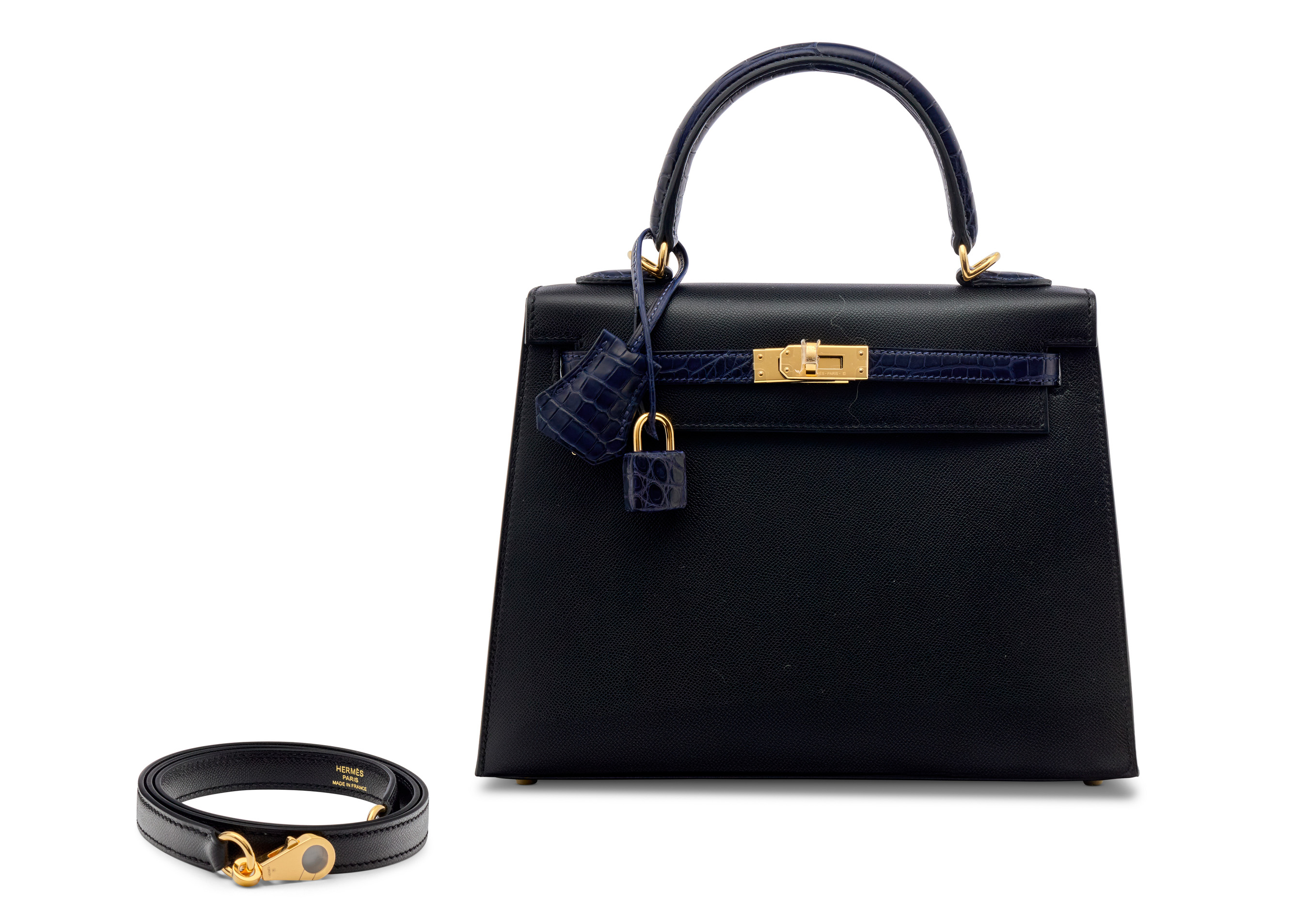 A limited-edition bleu marine matte alligator and black veau madame leather Sellier Touch Kelly 25 with gold hardware, Hermes, 2024, offered in Handbags Online: The Paris Edit from 30 October to 14 November 2024 at Christie's Online