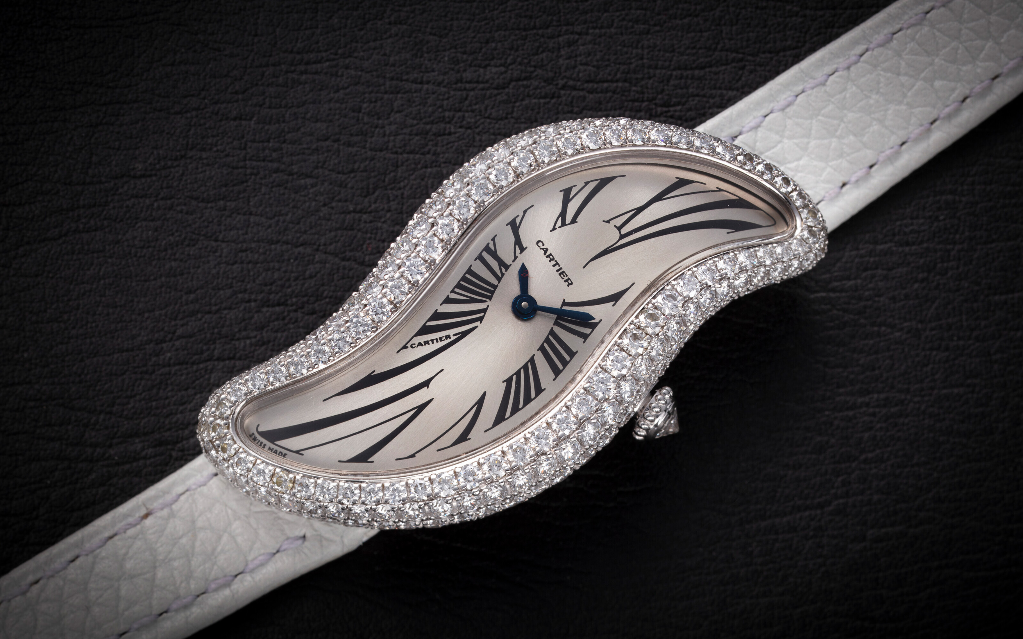 Cartier. A Baignoire S ‘Crash’ ref. 3174 gold and diamond-set asymmetrical wristwatch