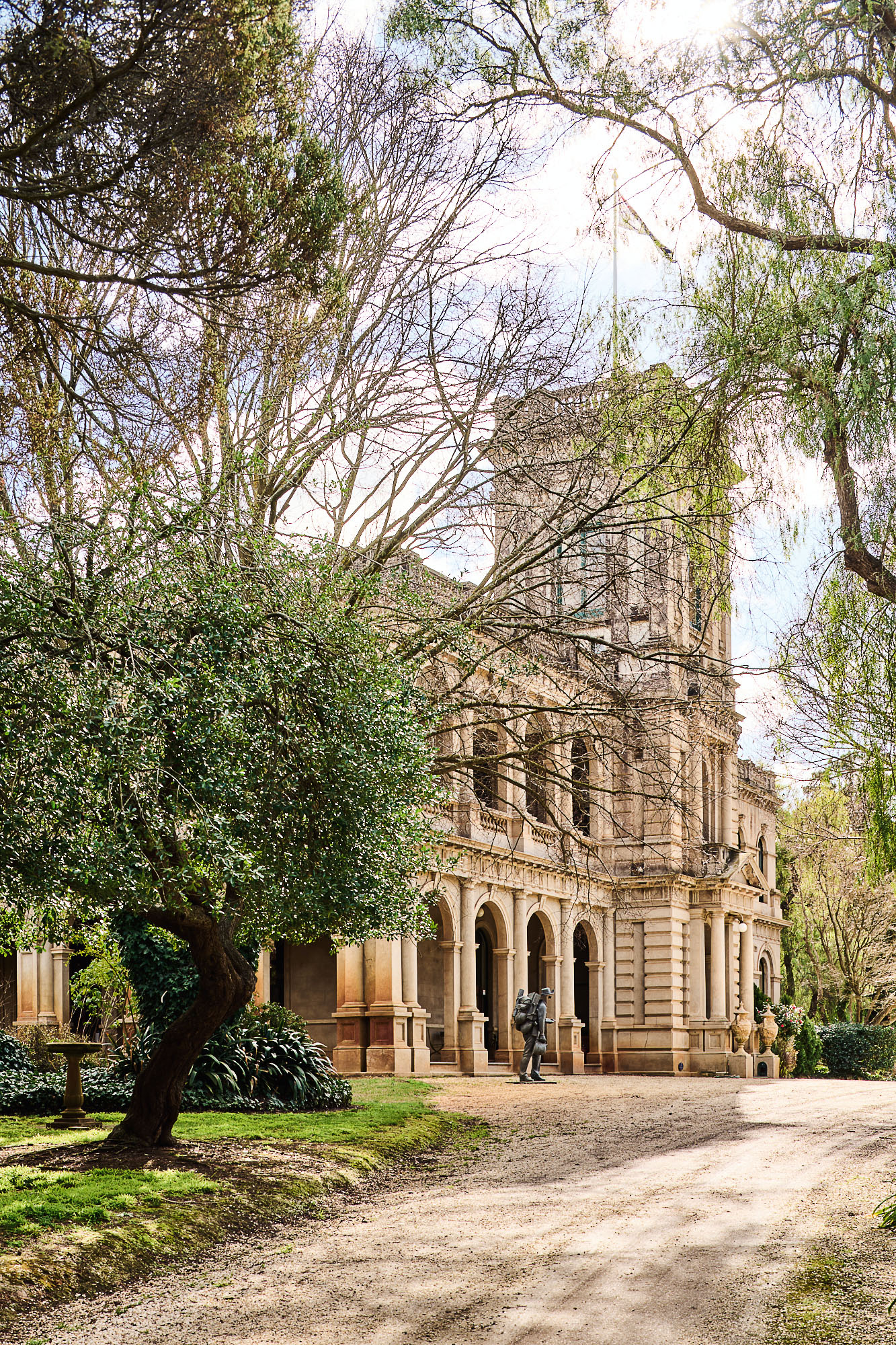 The carriage drive leading to the Italianate entrance facade