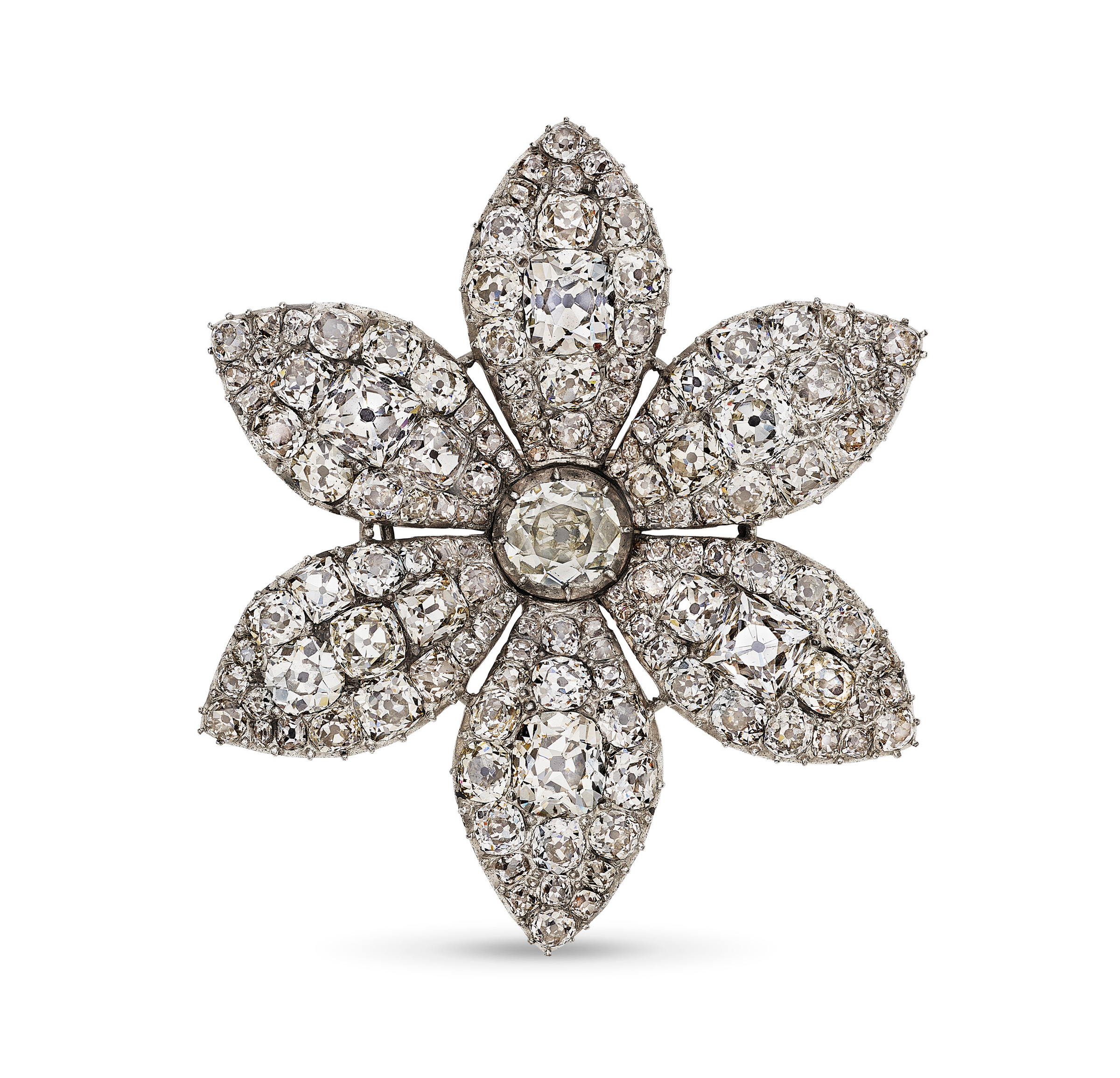 An intricate diamond brooch designed in the shape of a flower, with a large central stone surrounded by detailed petals.