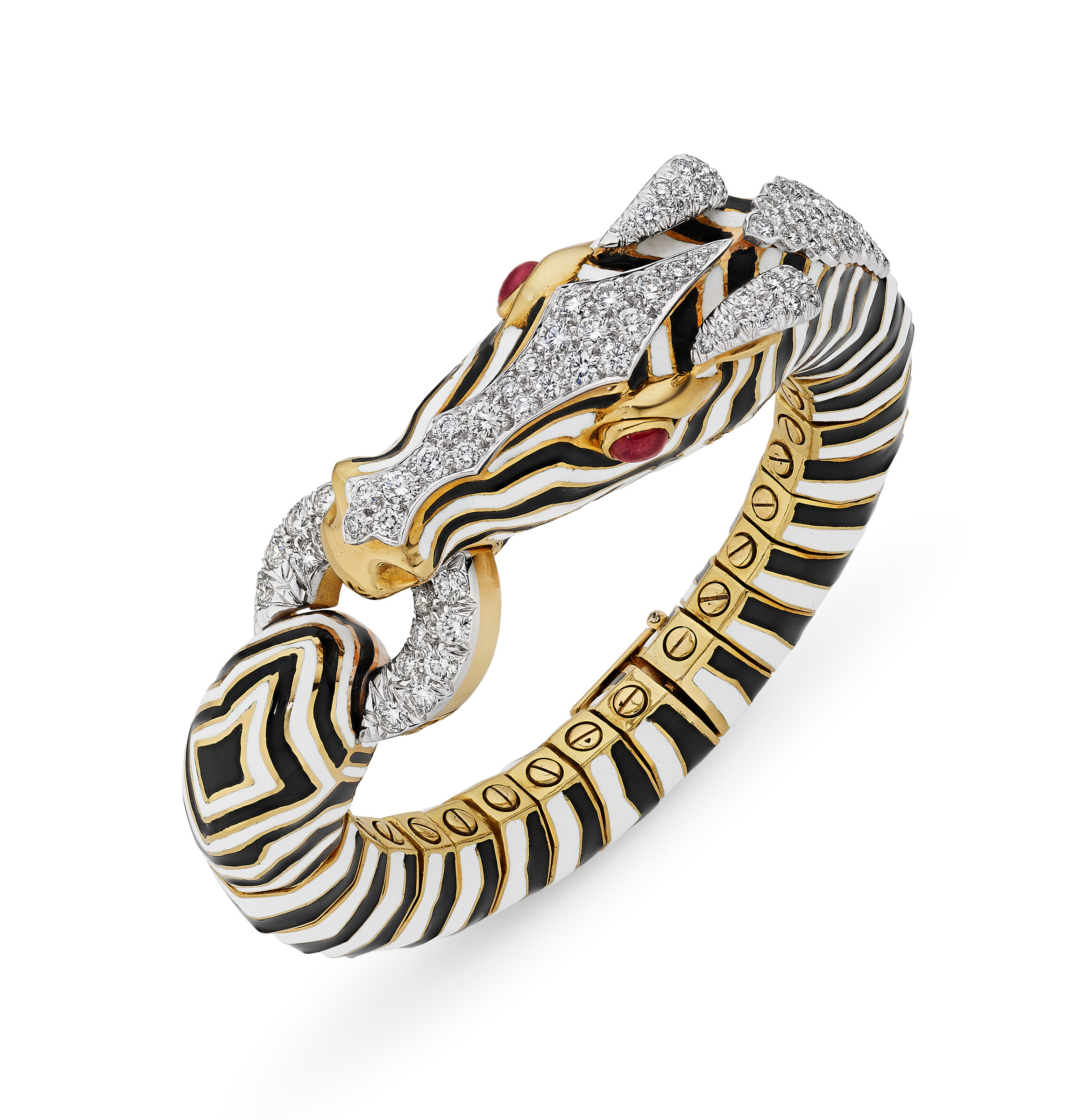 A bracelet featuring zebra stripes in black and white enamel with gold and diamond accents, and ruby-set elements.