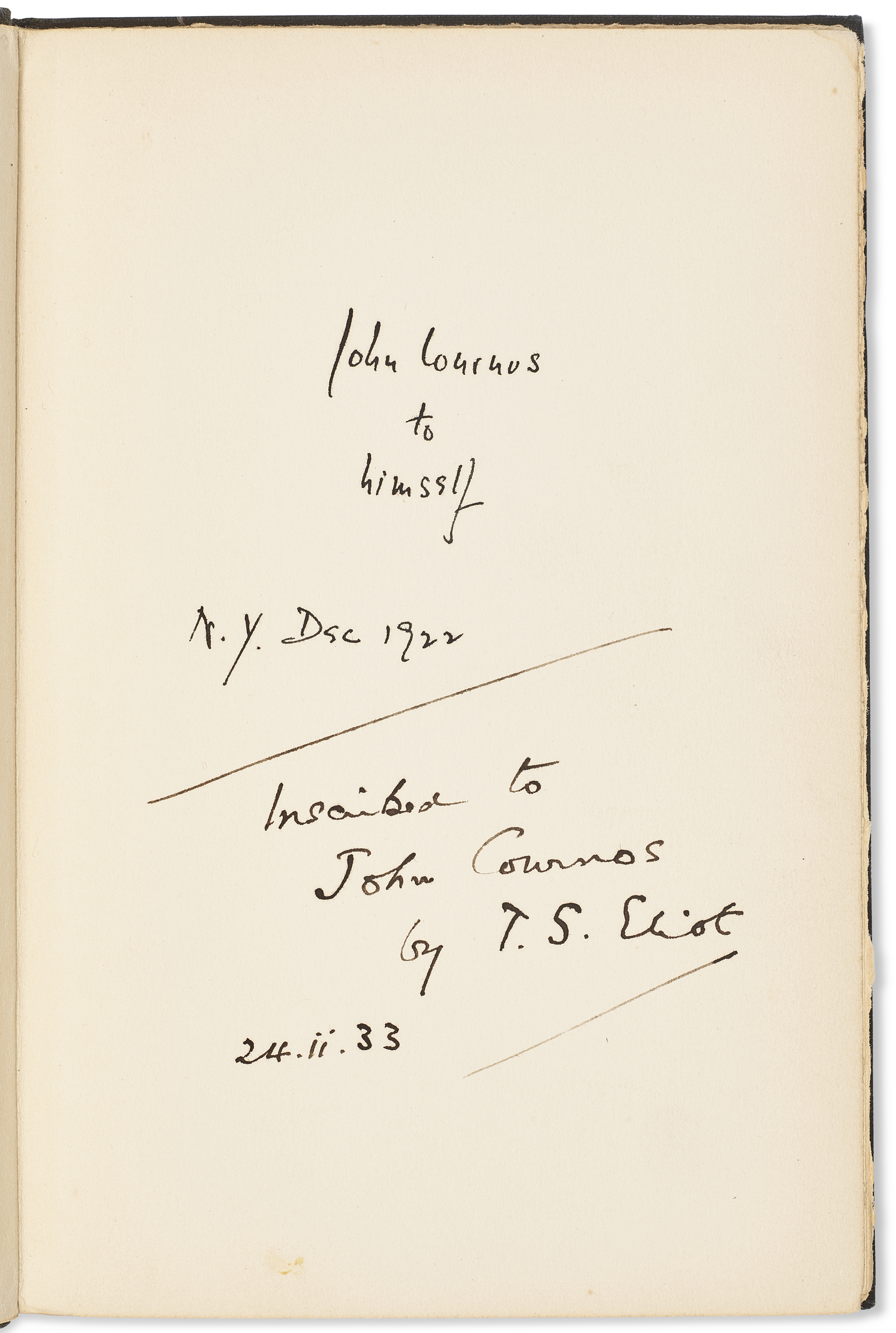 An open book page showing a handwritten inscription "John Cournos to himself" with a note dated N.Y. Dec 1927 and signed by T.S. Eliot on 24.ii.33.