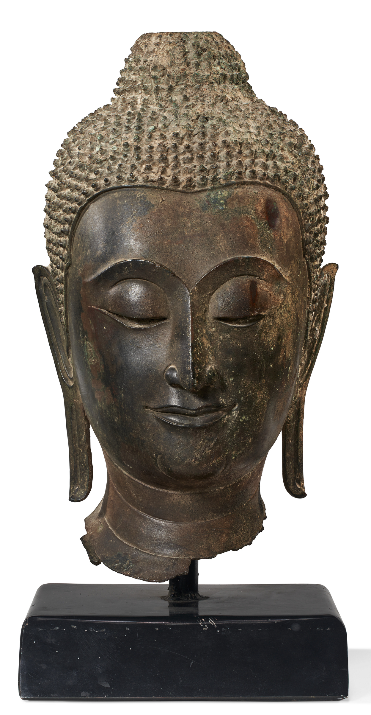 The image shows a bronze sculpture of a person with intricate hair detail, mounted on a black pedestal.