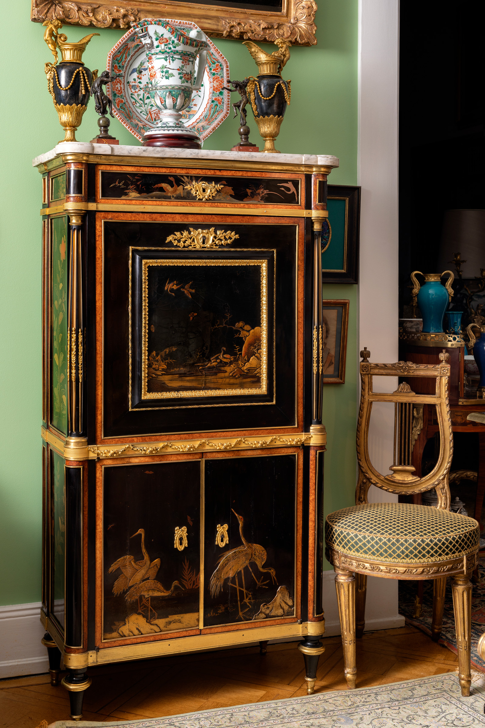 A late Louis XVI ormolu-mounted Chinese and European lacquer secretaire, late 18th century, offered in Collections: Entre Orient et Occident au XVIIIe siecle, regard d'un amateur eclaire and Souvenirs des princes Murat, until 15 April 2025 at Christie's Online