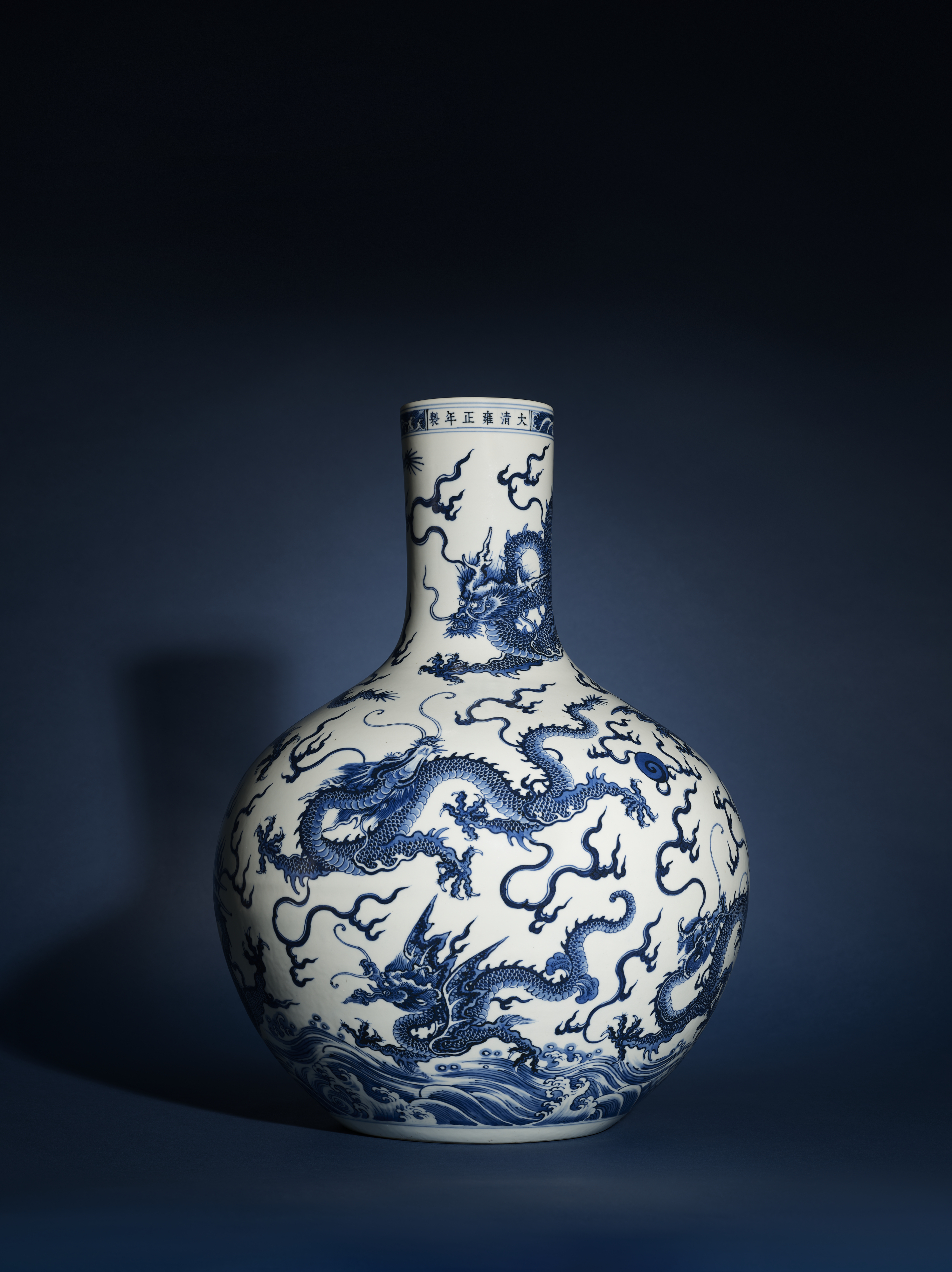 A fine and extremely rare large blue and white ‘dragon’ vase, tianqiuping. Yongcheng six-character mark in underglaze blue in a line and of the period (1723-1735). 20 3/8 in. (51.5 cm.) high. Estimate: HK$70,000,000-90,000,000. Offered in the Ravishing Blue : Imperial Porcelains From An Important Private Collection on 2 May at Christie’s in Hong Kong