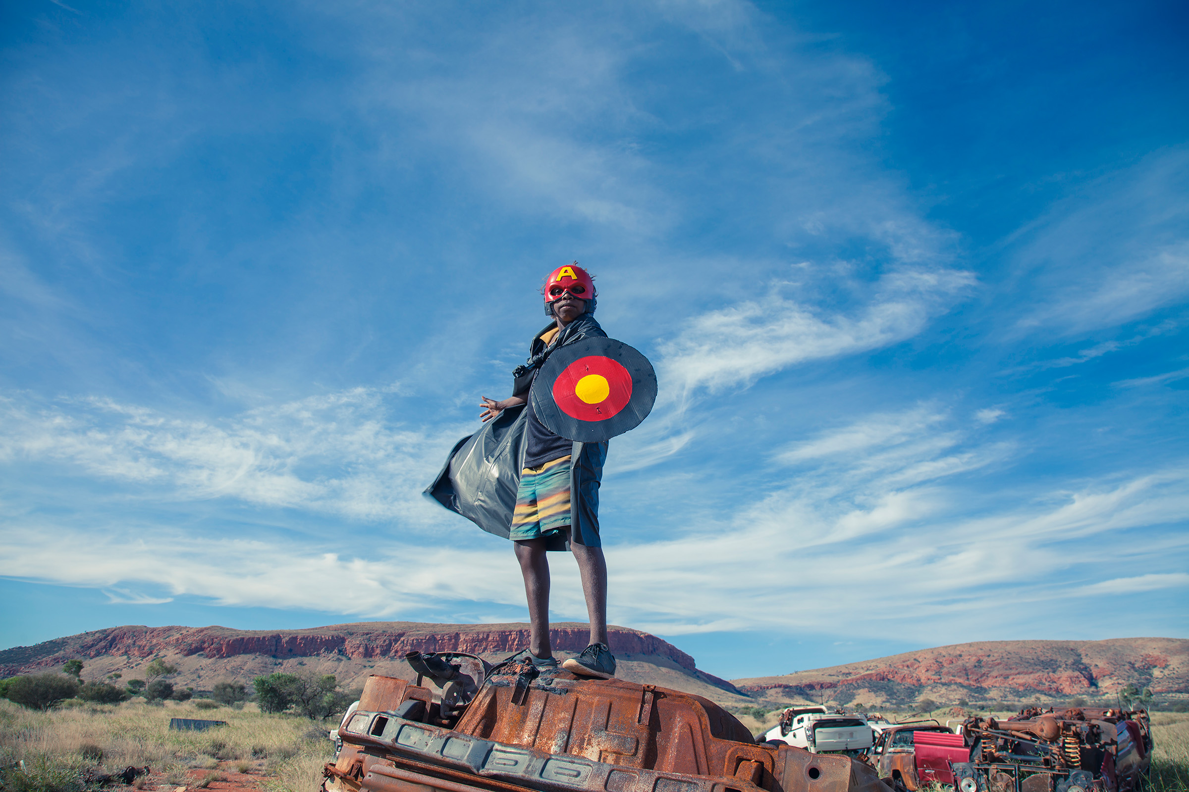 Tony Albert, David Charles Collins and Kieran Lawson, Warakurna Superheroes #1, from the Warakurna Superheroes series, 2017, in On Country: Photography from Australia at Les Rencontres de la Photographie, Arles, France