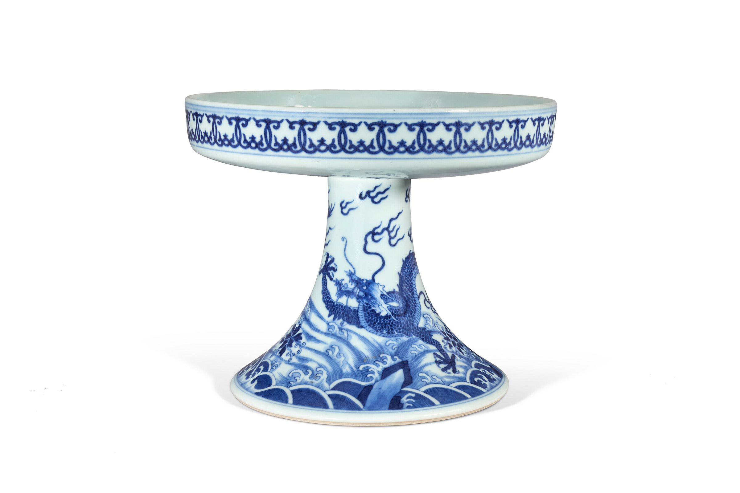 A rare blue-and-white Dragon and Carp tazza. China, Qing dynasty, Qianlong six-character seal mark in a line in underglaze blue and of the period (1736-1795), offered in Art d'Asie on 10 June 2025 at Christie's in Paris