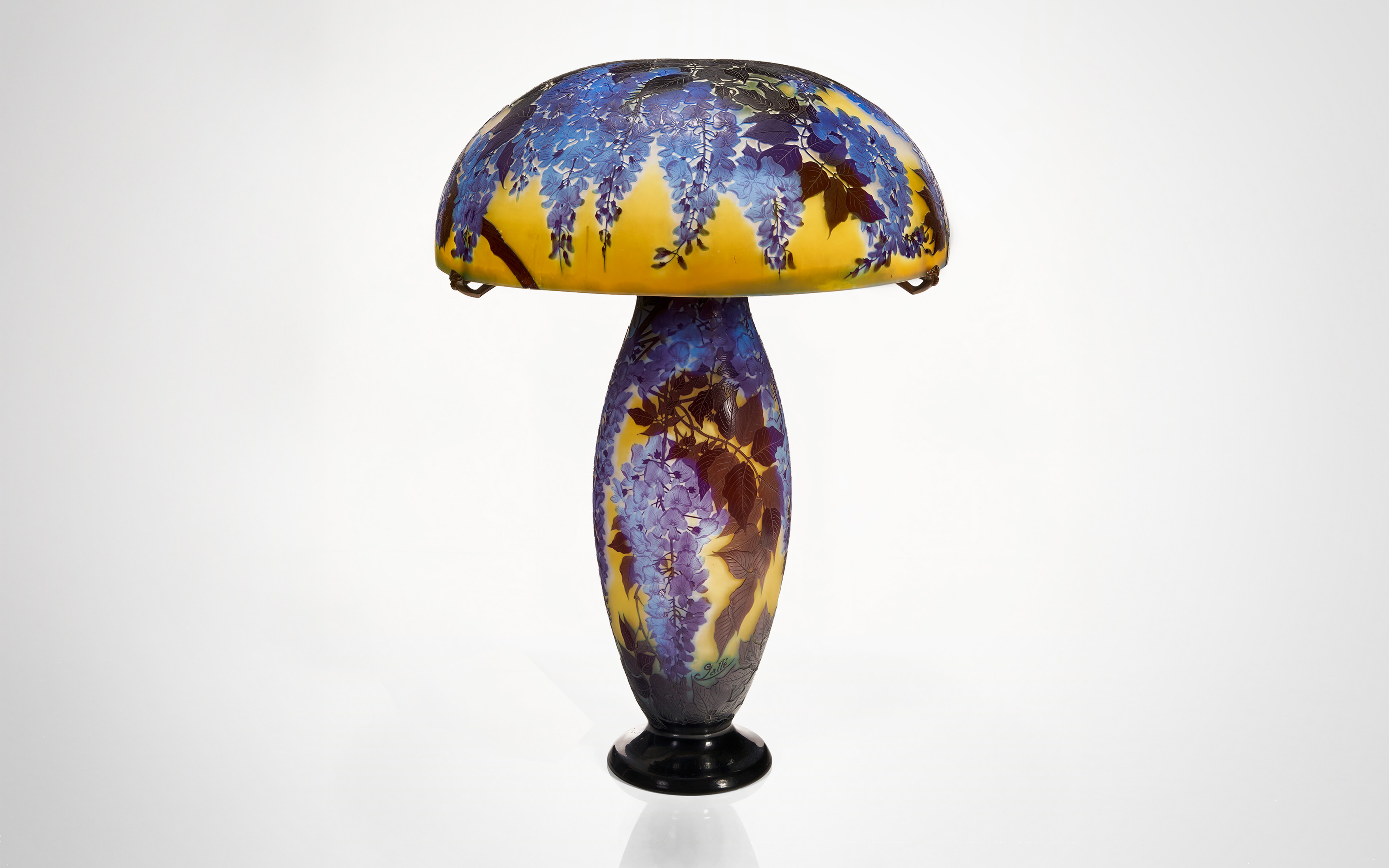Galle, a Wisteria table lamp, circa 1925, sold for $214,200 on 7 June 2024 at Christie's in New York