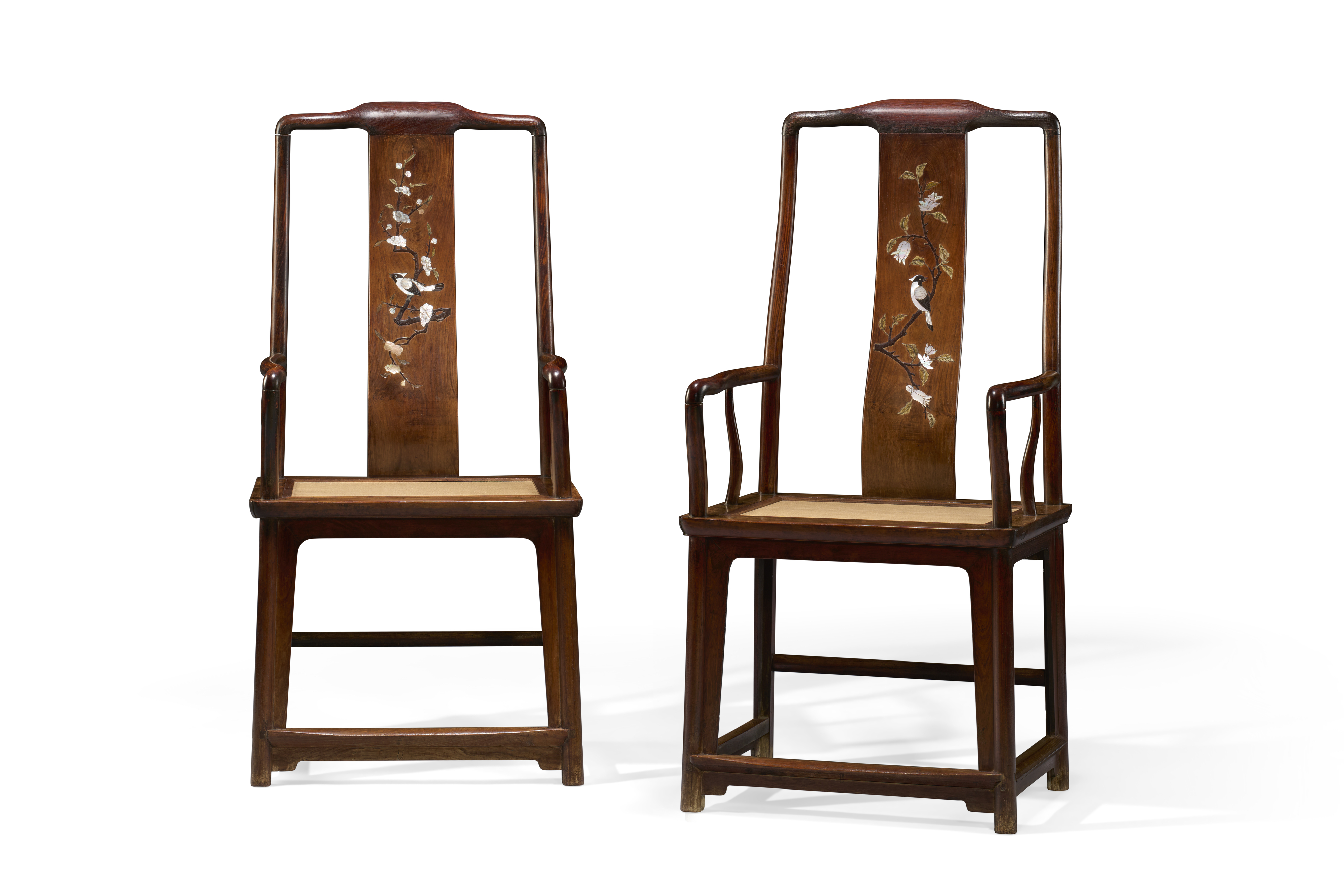 A very rare pair of inlaid huanghuali ‘southern official’s hat’ armchairs, 16th–17th century. 49¾ in (126.4 cm) high, 24⅛ in (61.3 cm) wide, 19⅛ in (48.6 cm) deep. Estimate: $250,000–350,000. Offered in Important Chinese Furniture and Works of Art on 18 September 2025 at Christie’s in New York