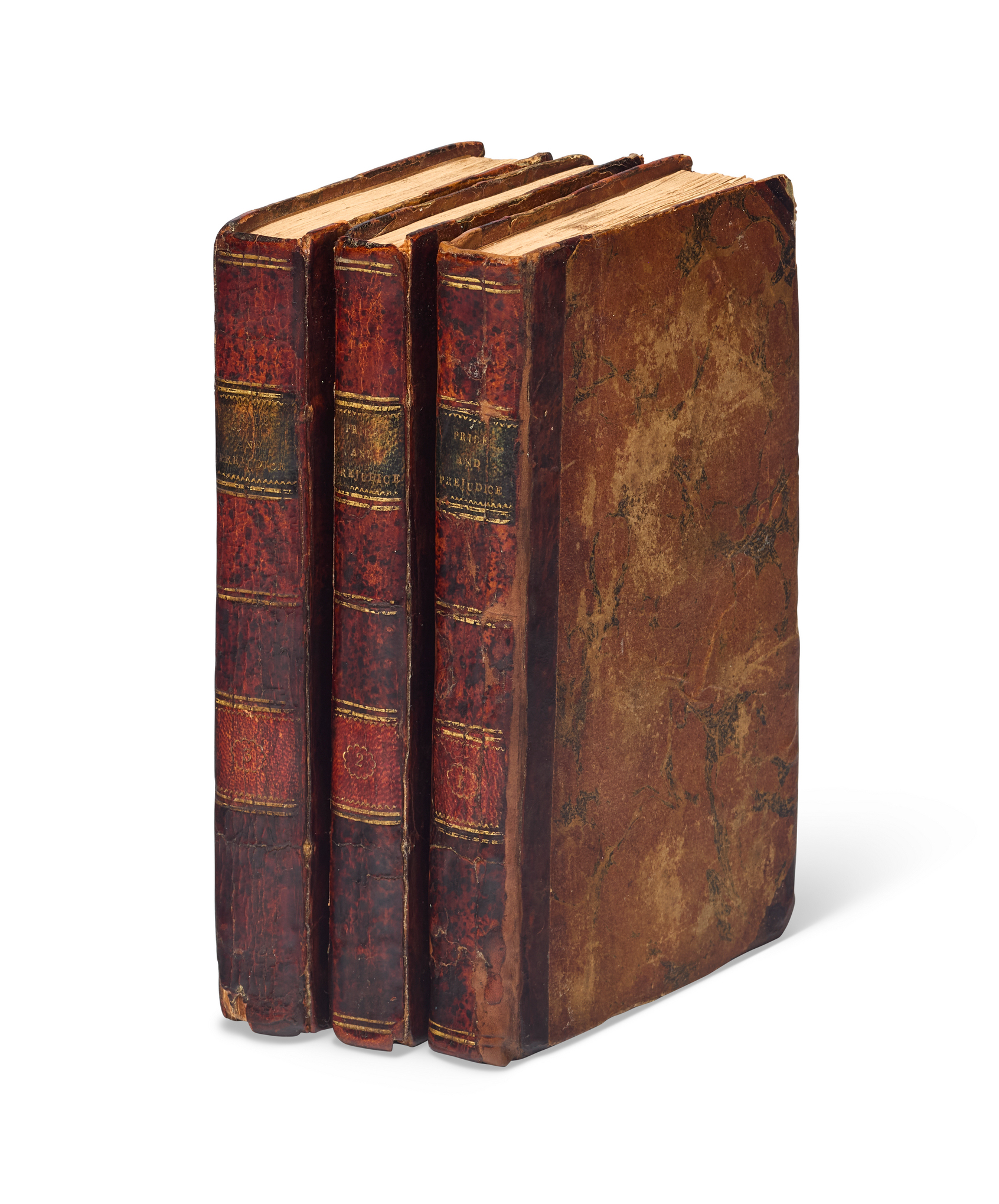 Three vintage books with leather bindings and gold lettering on spines.