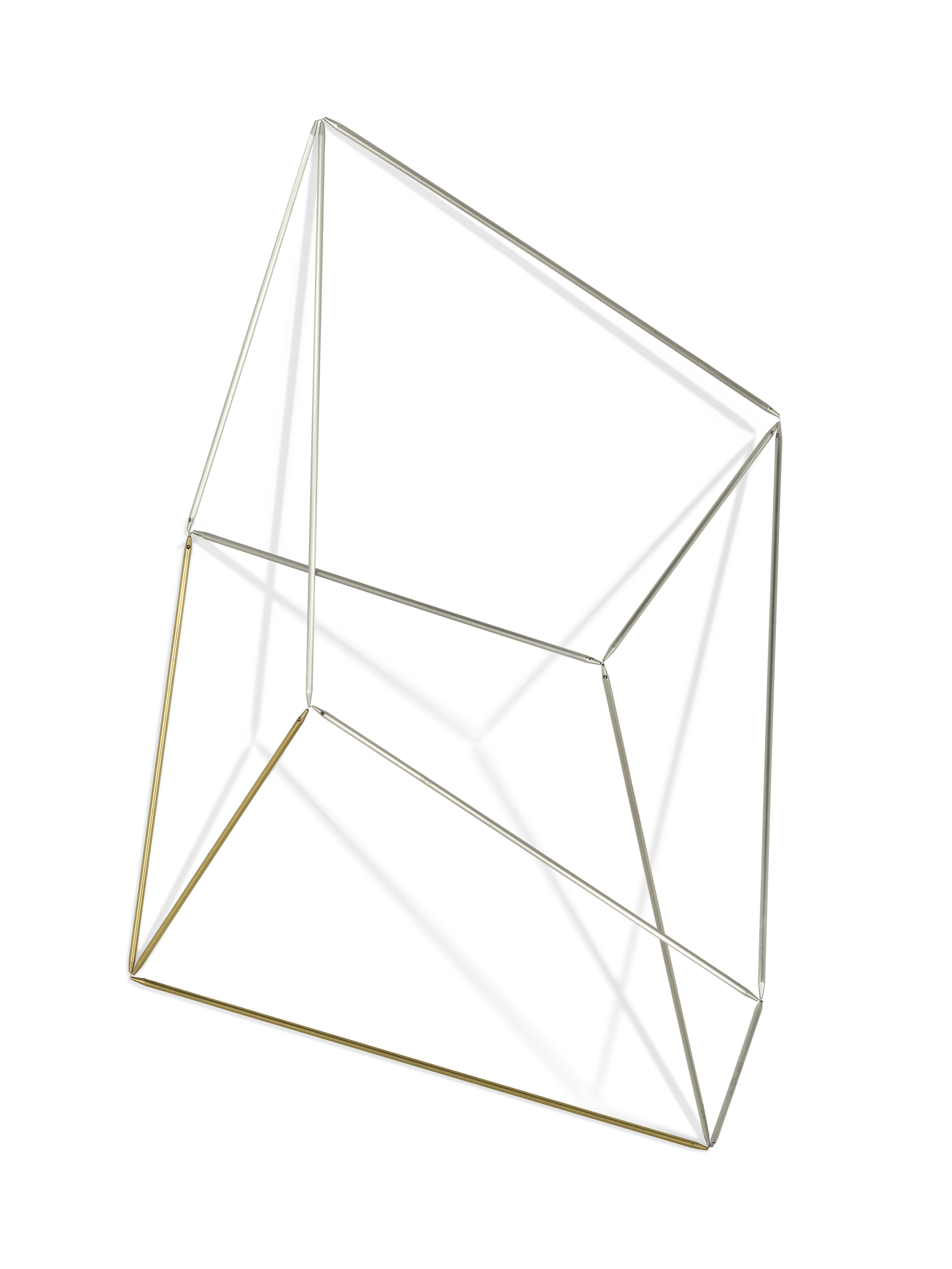 A minimalist gold geometric wire sculpture isolated on a white background.
