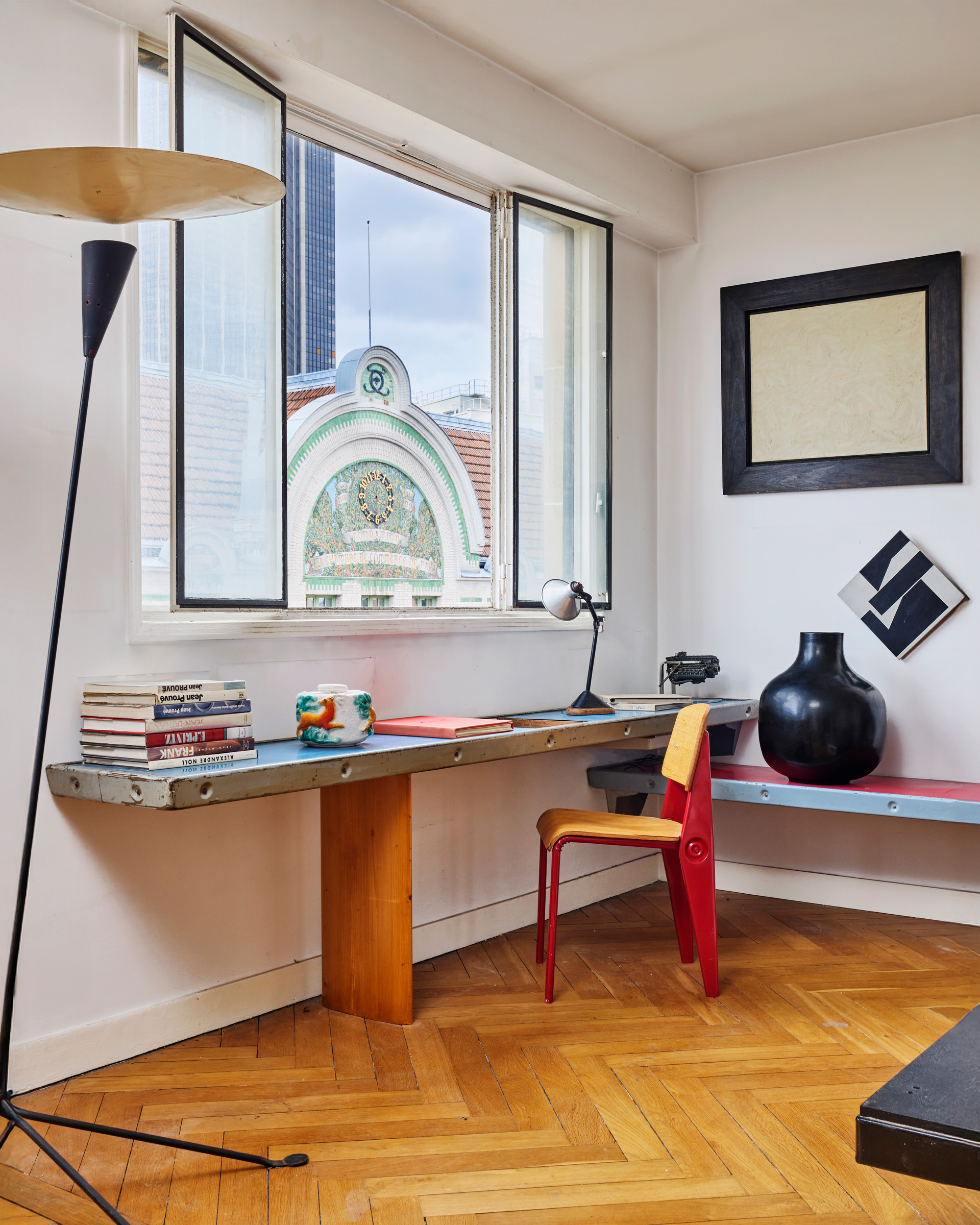 From left: B 211 floor lamp by Michel Buffet, 1953; Georges Jouve's Decor cerf tobacco pot, circa 1948 sits on a Tunisie console from 1952 by Charlotte Perriand. The chair is one of a pair of Cafeteria n. 300 by Jean Prouve, circa 1952. Partially visible to the right is Perriand's Tunisie bookshelf and bench, 1952, on which rests a Bonbonne vase by Jouve, circa 1955. All offered in Design, 1925-2025: la Modernite en Heritage on 26 November 2025 at Christie's in Paris