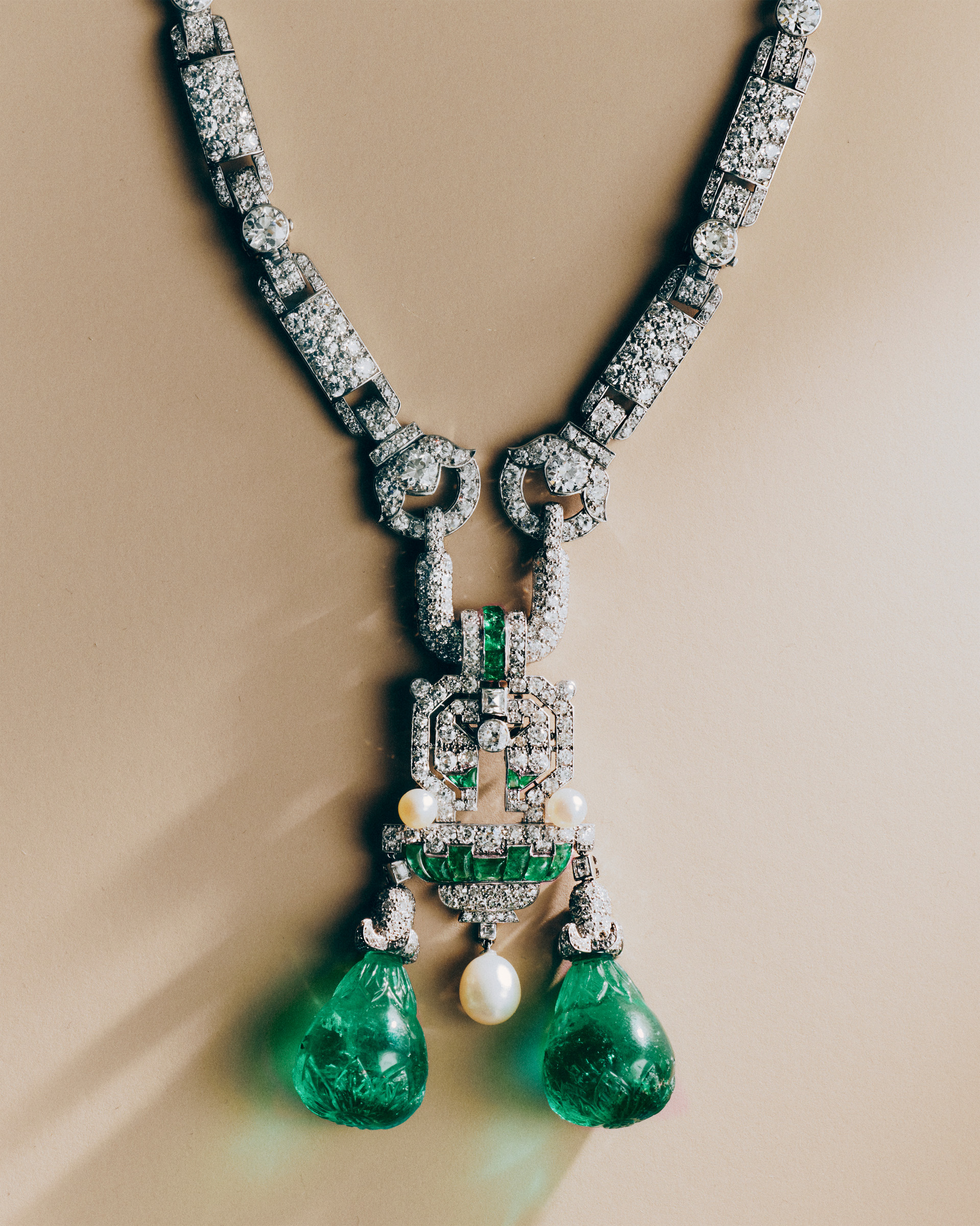 An Art Deco emerald, natural pearl and diamond pendant, circa 1925, offered in London Jewels until 25 November 2025 at Christie's Online
