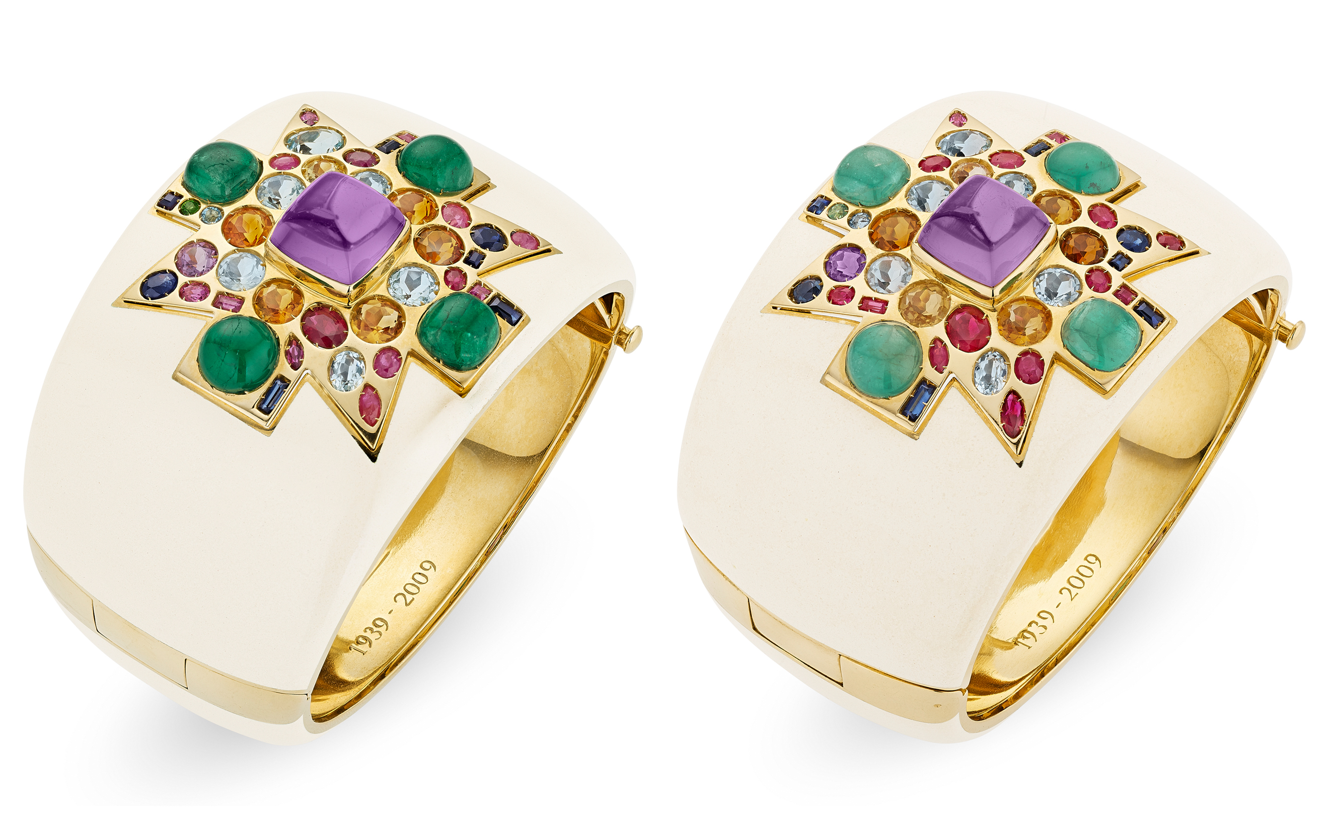 A pair of cream-colored bracelets with gold accents, decorated with colorful gemstones in a geometric star pattern.