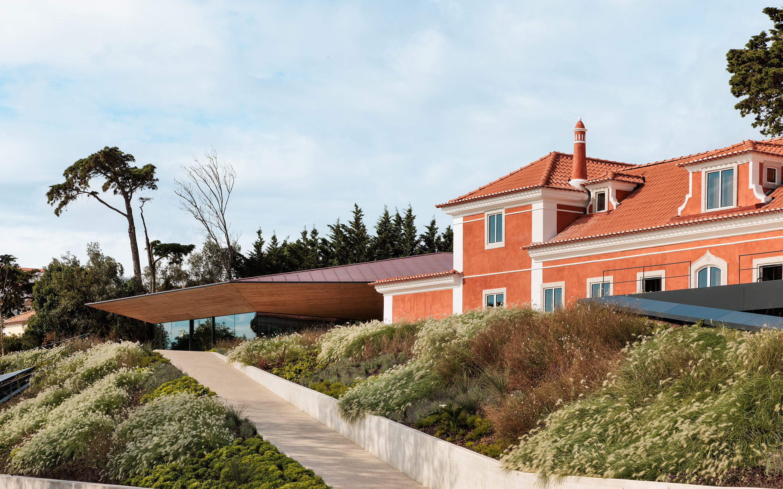 Set in a historic estate near Sintra in Portugal, the Albuquerque Foundation occupies a restored 18th-century property and new buildings by Bernardes Arquitetura. 'I used to spend summers and Christmases here, so the place has emotional resonance for me,' says co-founder Mariana Teixeira de Carvalho