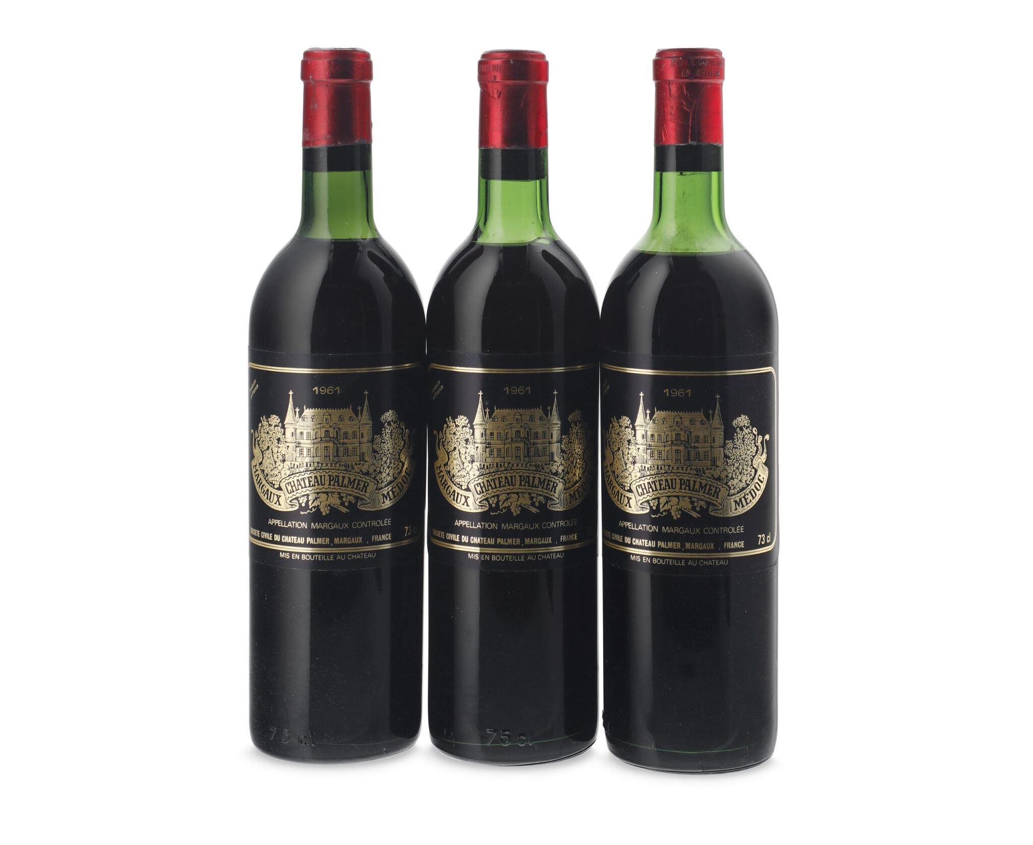 Three bottles of Château Palmer Margaux red wine from 1961 with black and gold labels and red wax seals.