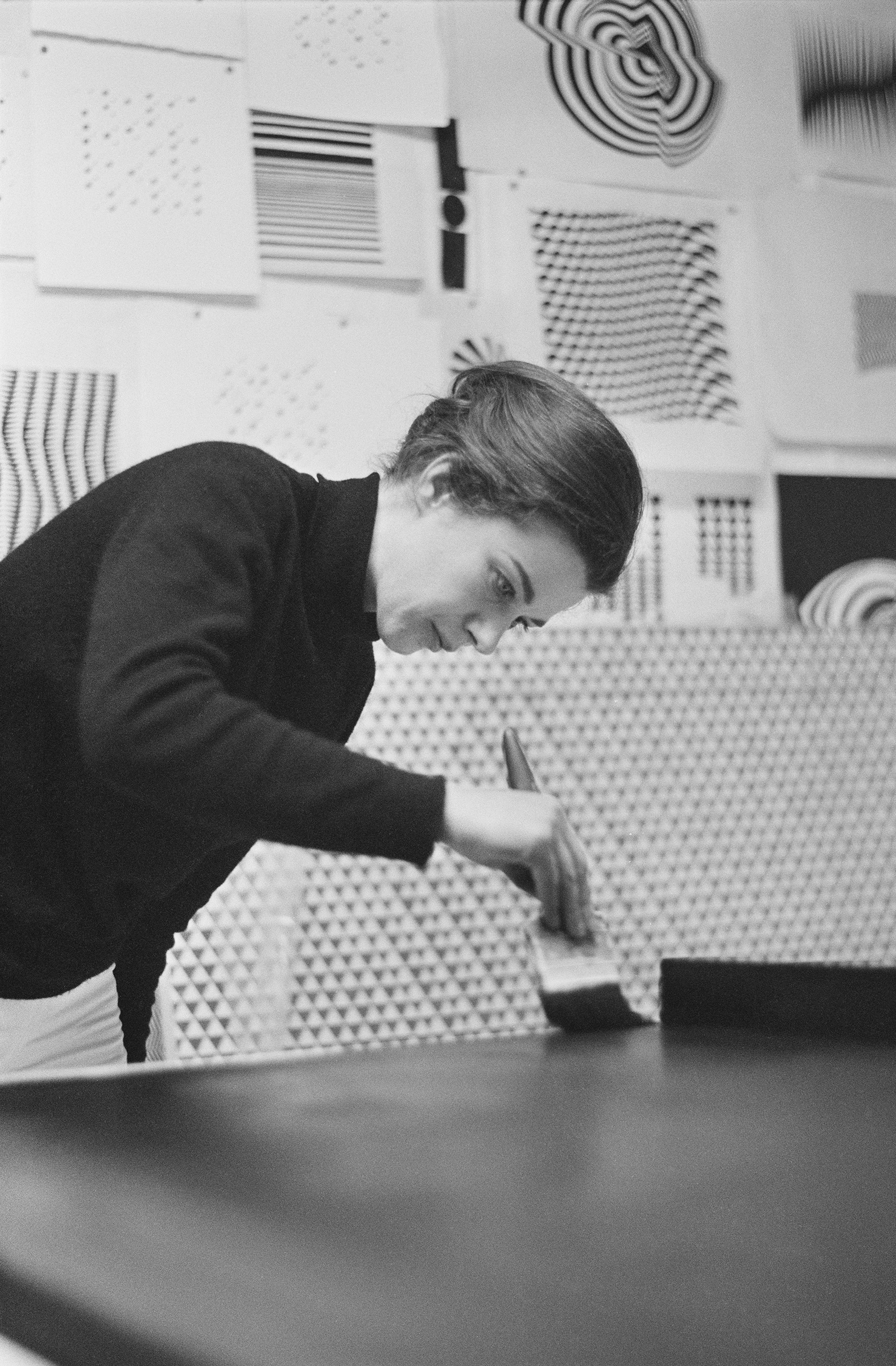 Bridget Riley at work in her studio, April 1964