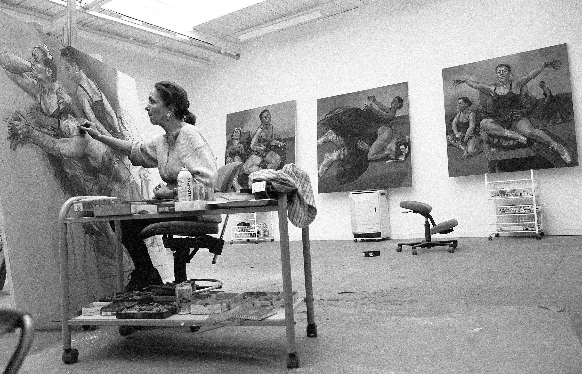 Paula Rego in her studio in 1995, working on the panel offered on 5 March 2026 at Christie's in London, with other works from the Dancing Ostriches series hanging in the background