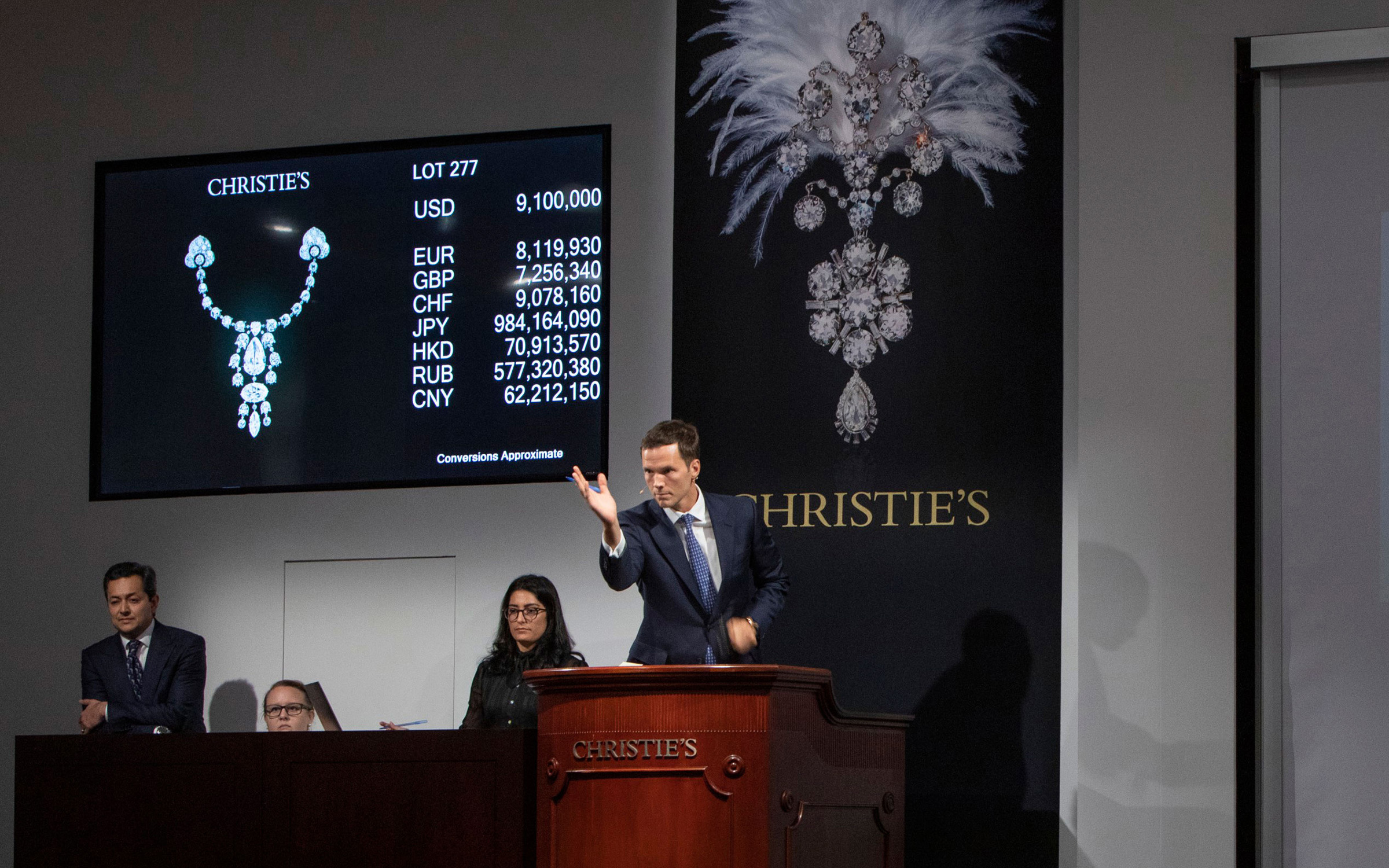 Max Fawcett selling a Belle Epoque diamond devant-de-corsage brooch by Cartier - which achieved a price of $10,603,500 - at the landmark Maharajas & Mughal Magnificence sale in June 2019 at Christie's in New York