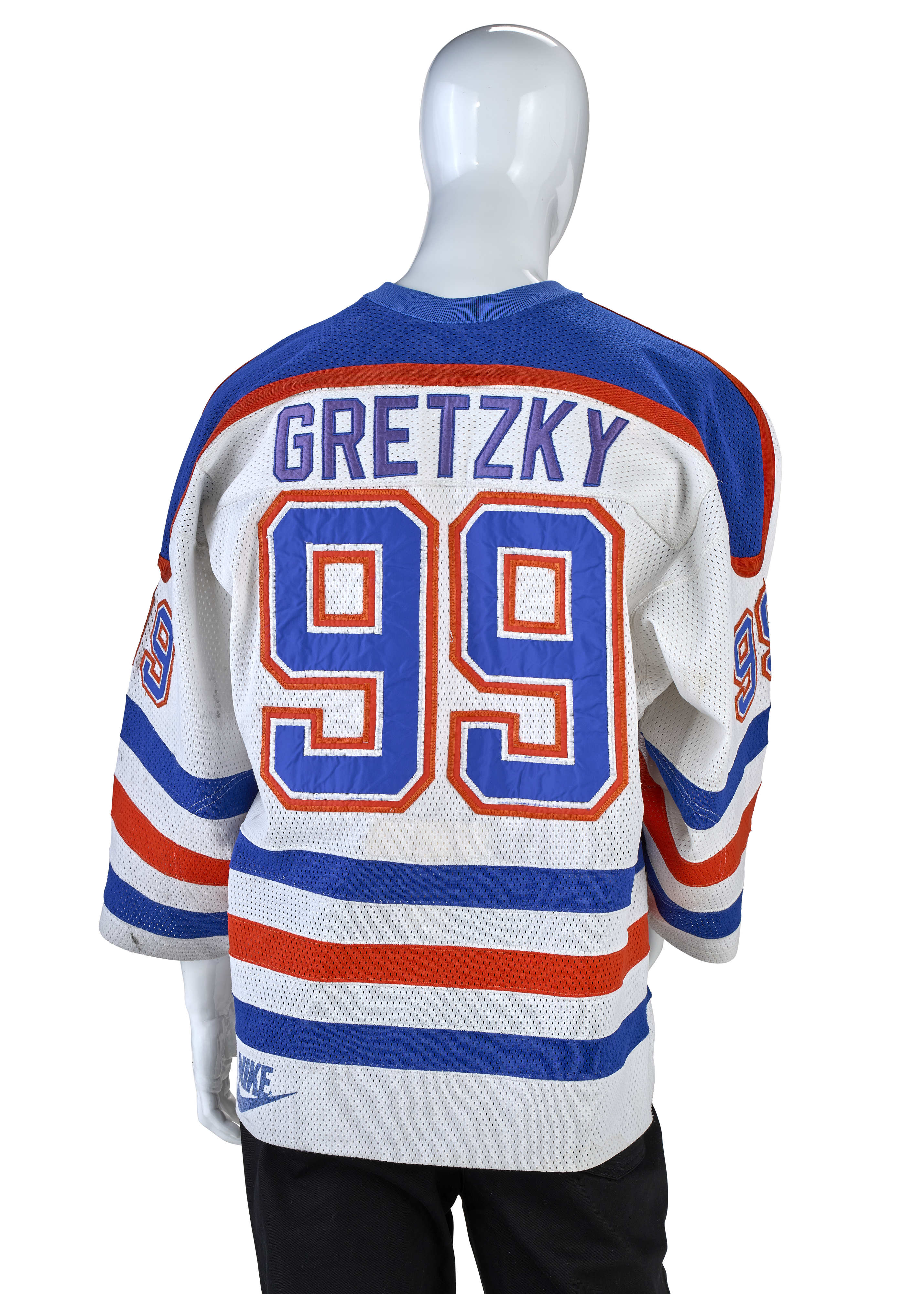 A mannequin displays a hockey jersey with "GRETZKY" and the number 99 on the back.