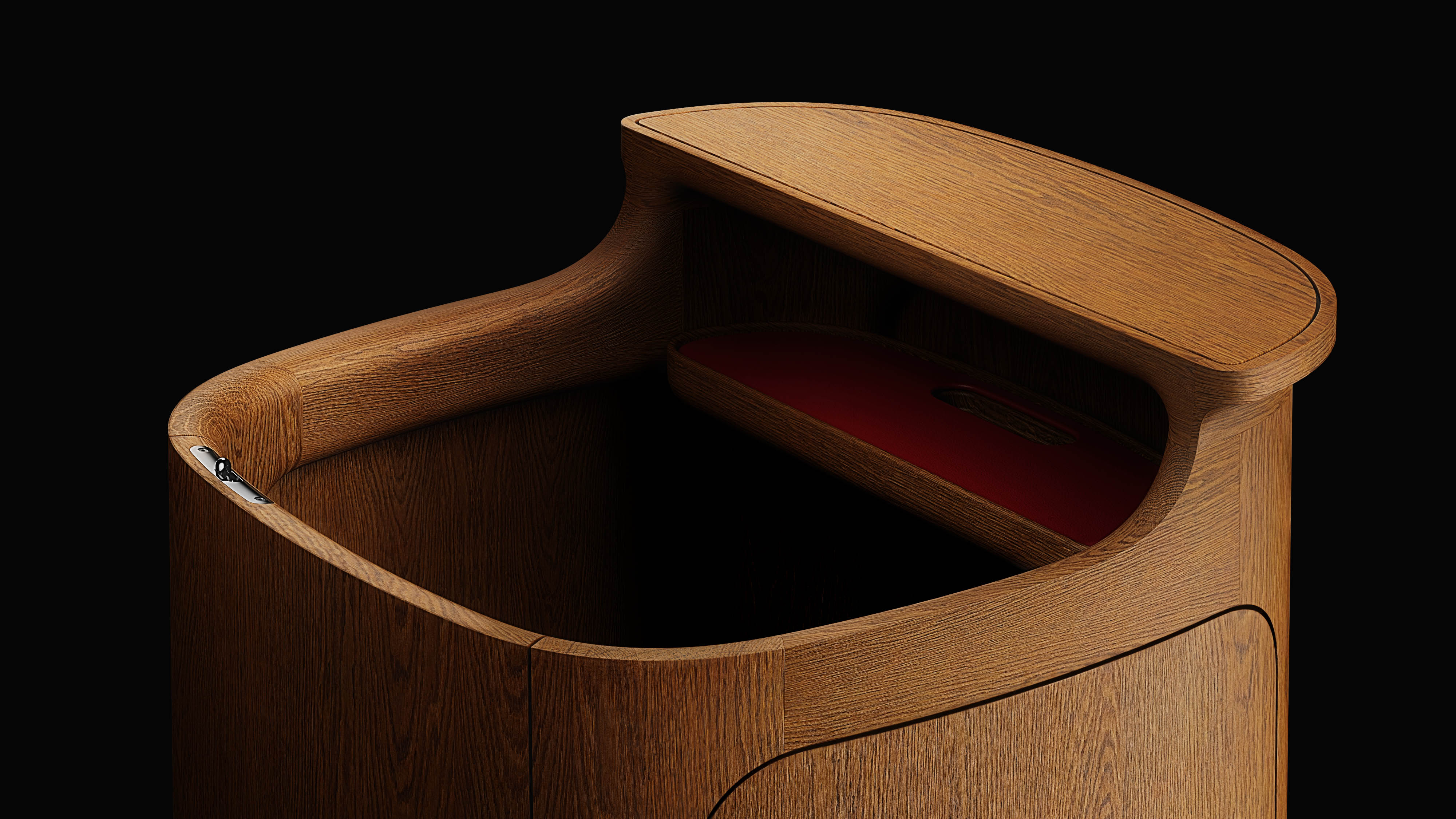 A modern wooden desk with smooth curves and a small red shelf inside, against a black background.