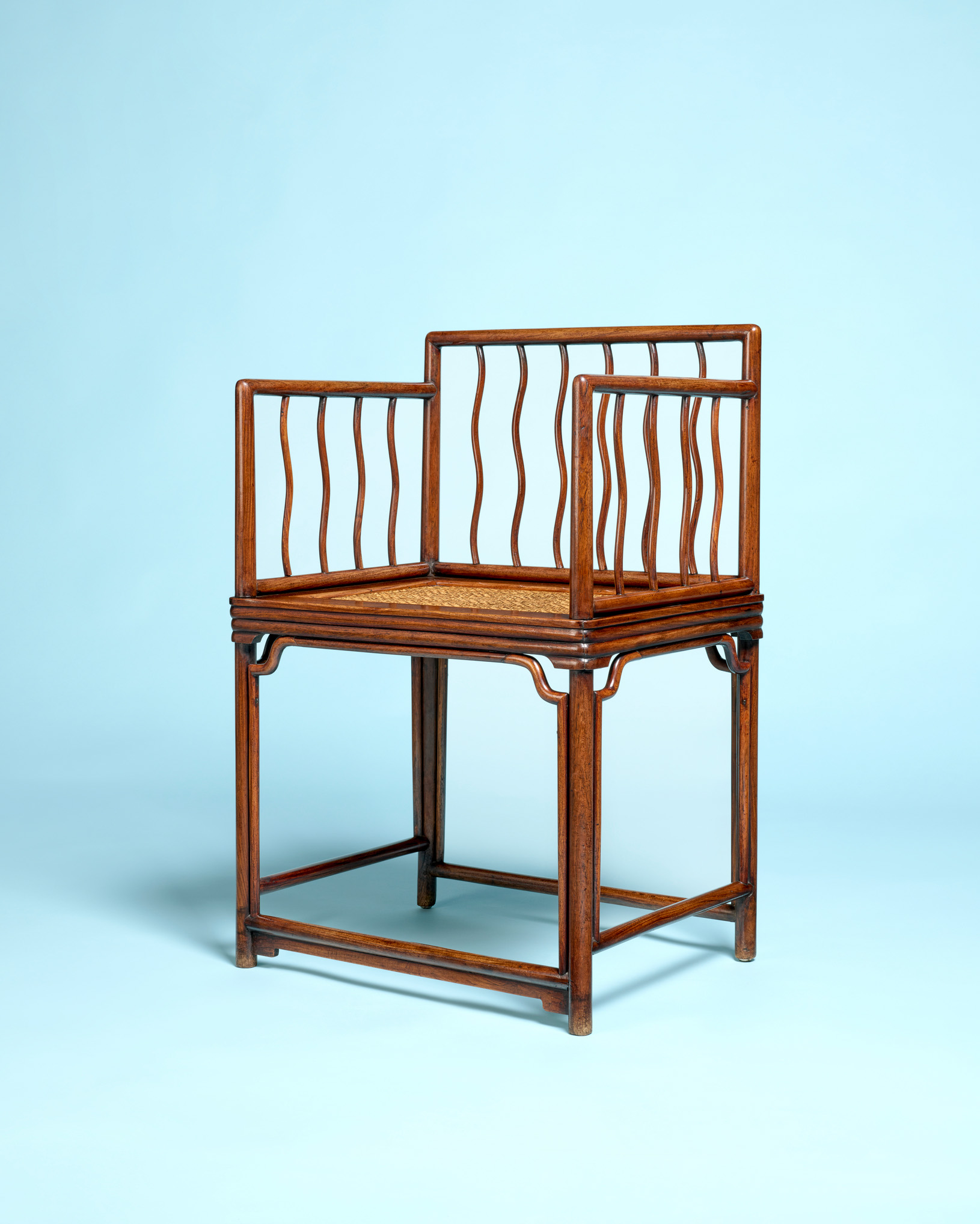 A very rare huanghuali S-spindle low-back armchair, China, 17th-18th century, offered in The Flacks Family Collection II: Curtain Call on 12 May 2026 at Christie's in London