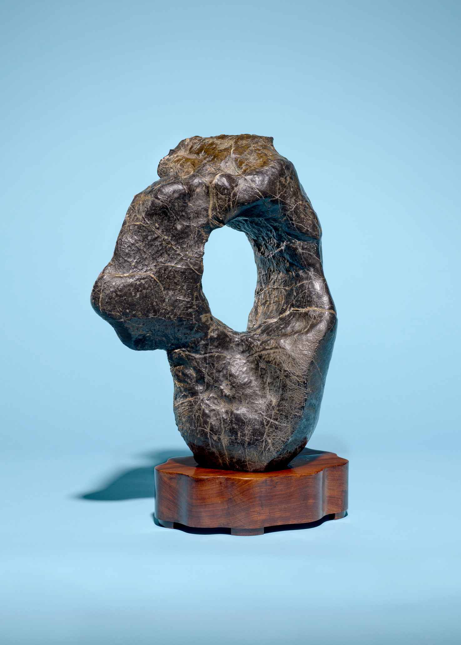 A pierced black Lingbi rock, China, offered in The Flacks Family Collection II: Curtain Call on 12 May 2026 at Christie's in London
