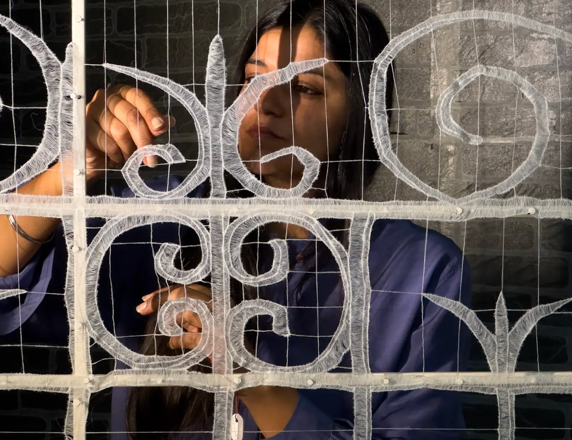 Sumakshi Singh, whose installation - a recreation in thread of her grandparents' Delhi house, which was demolished - anchors the pavilion. 'Using thread to recreate a house isn’t just poetic - it's culturally loaded,' says Jaffer. 'It connects the personal story of the artist to a much broader civilisational history.'