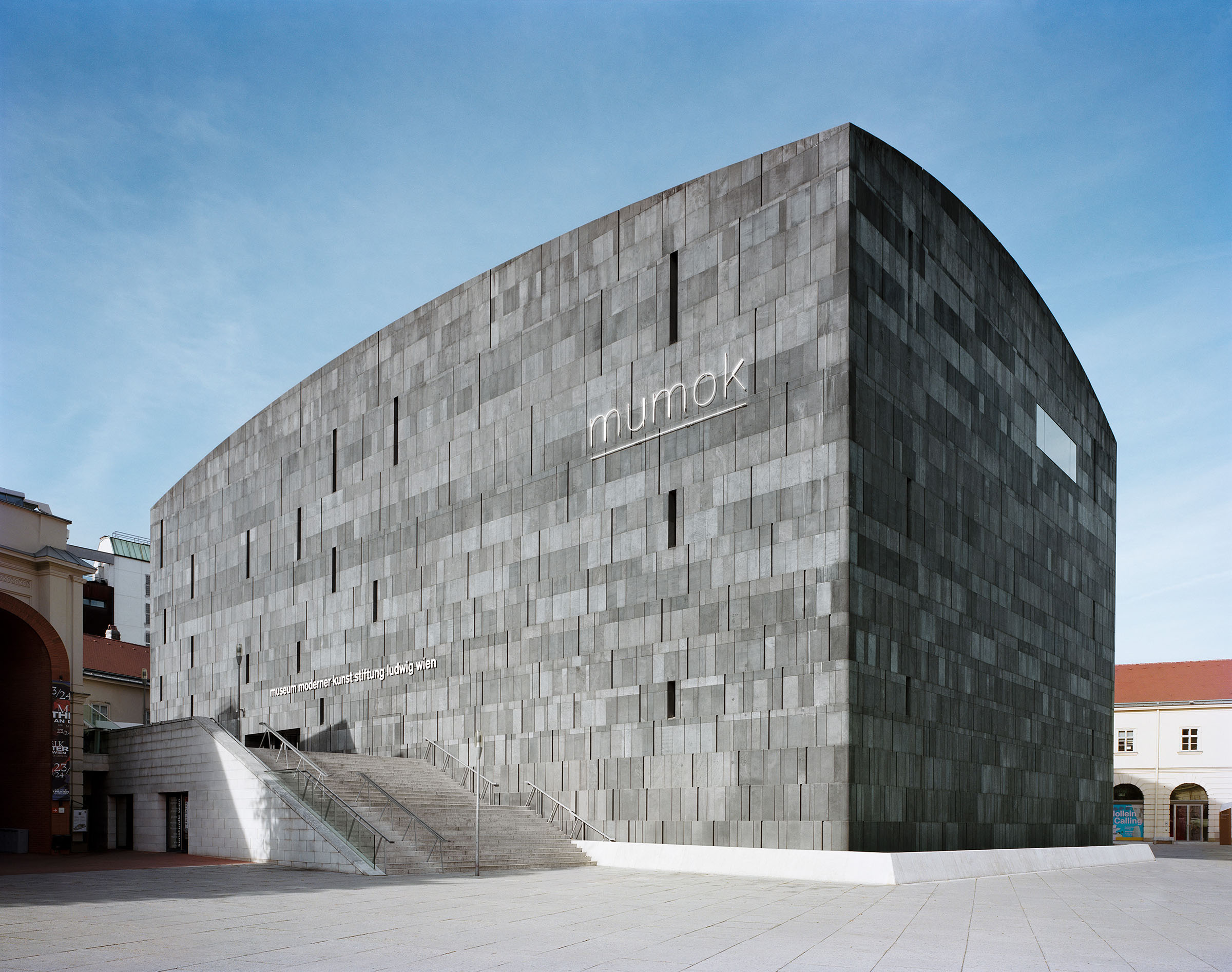The monolithic, anthracite-grey basalt structure of mumok, one of the MuseumsQuartier's most eye-catching buildings, by Ortner and Ortner