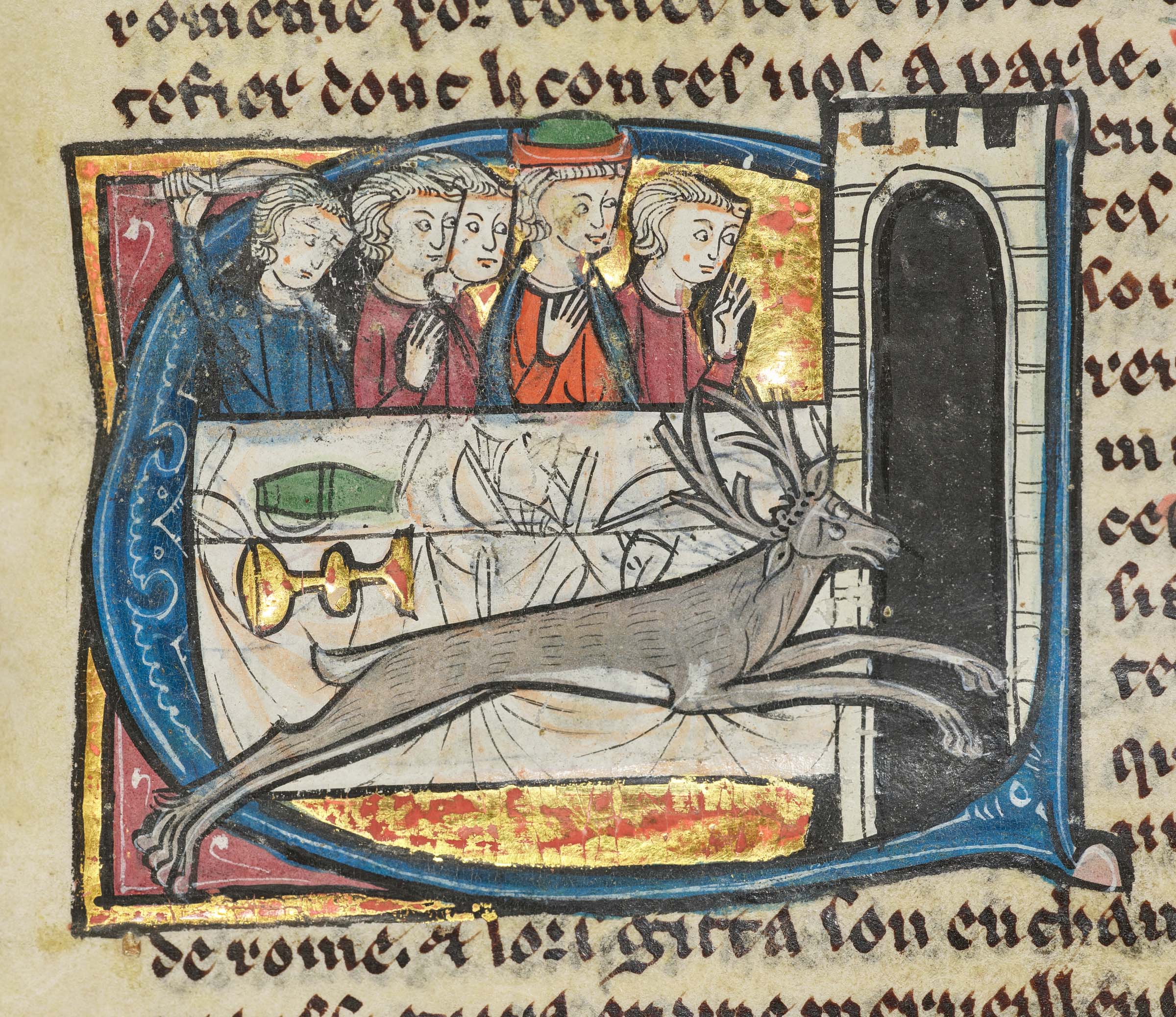 In the manuscript, Merlin takes many forms: here he appears as a stag, overturning all the food and vessels as he rushes out of the imperial hall; elsewhere, he is an old shepherd beneath the walls of Camelot, a messenger and a knight in armour