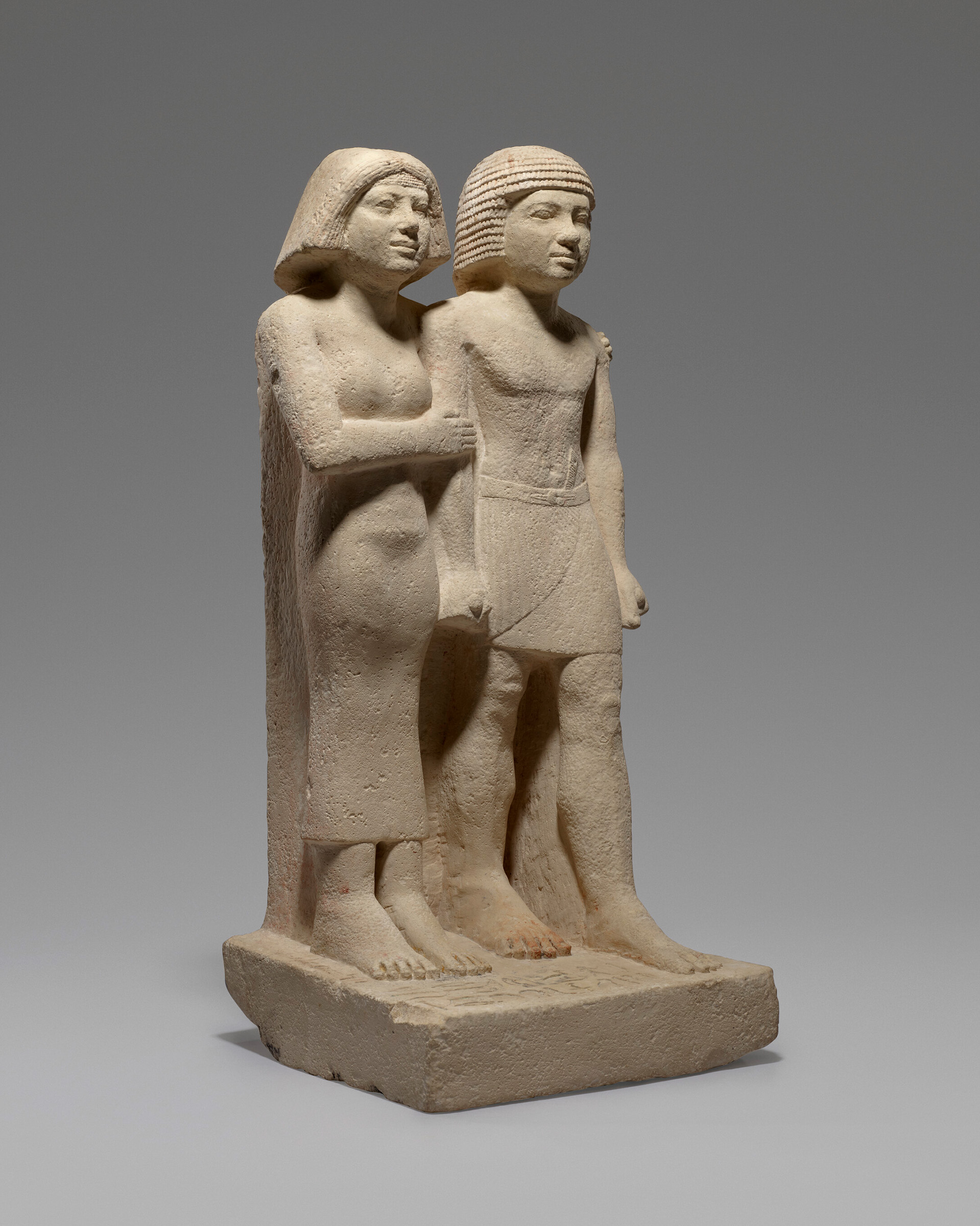 An Egyptian limestone pair statue of the royal acquaintances Nebefwy and Mes-Sat. Old Kingdom, mid- to late 5th dynasty, circa 2400-2300 B.C., offered in The Exceptional Sale: Masterworks Across Cultures on 30 June 2026 at Christie's in London