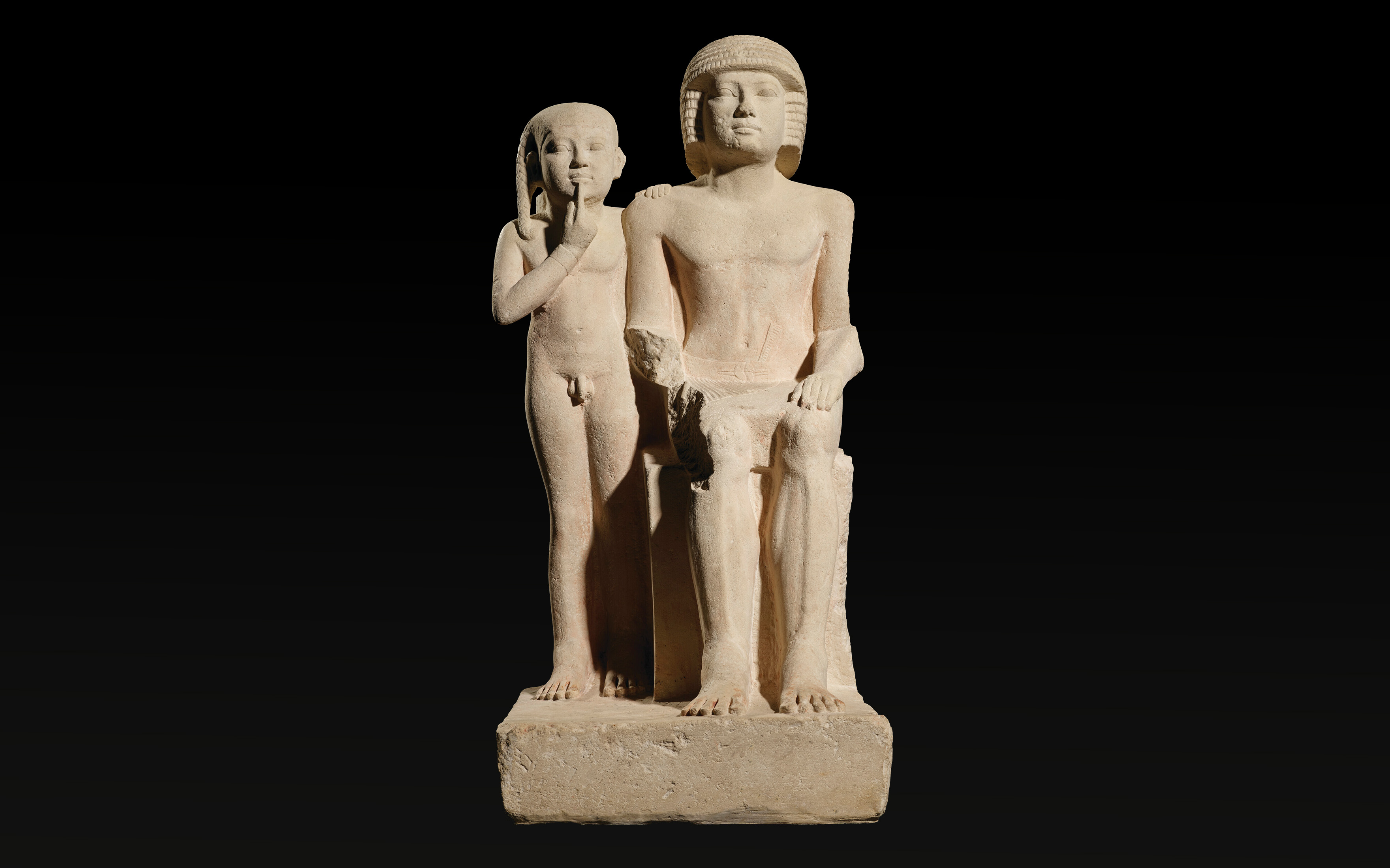 An Egyptian limestone group statue for Mehernefer and his son. Old Kingdom, mid-late 5th dynasty, circa 2400-2300 B.C. Sold for £6,014,500 on 7 July 2022 at Christie's in London