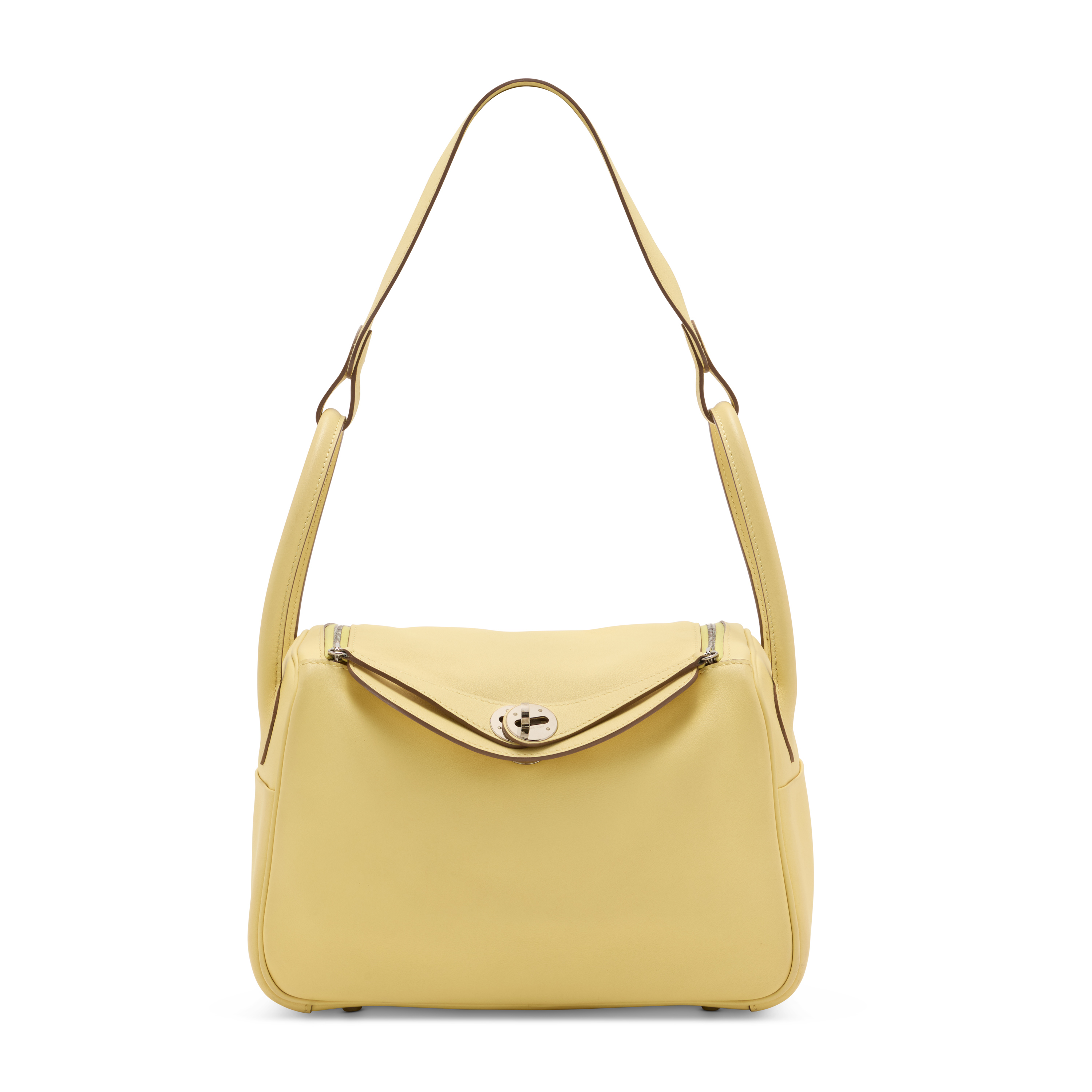 A jaune poussin swift leather lindy 26 with palladium hardware, Hermès, 2016. Estimate: HK$40,000-60,000. Offered in Handbags Online: the Hong Kong edit, until 14 July at Christie’s Online 