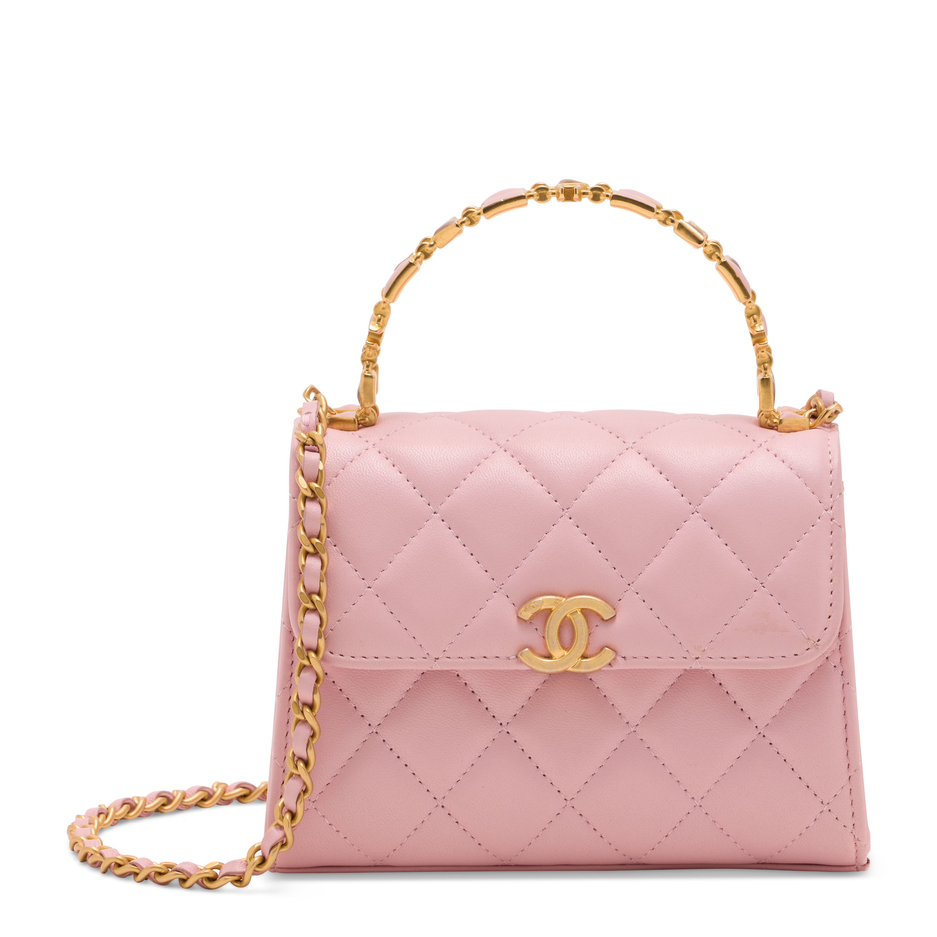 A pink quilted lambskin leather top handle flap bag with gold hardware, Chanel, circa 2024. Estimate: HK$30,000-40,000. Offered in Handbags Online: the Hong Kong edit, until 14 July at Christie’s Online 