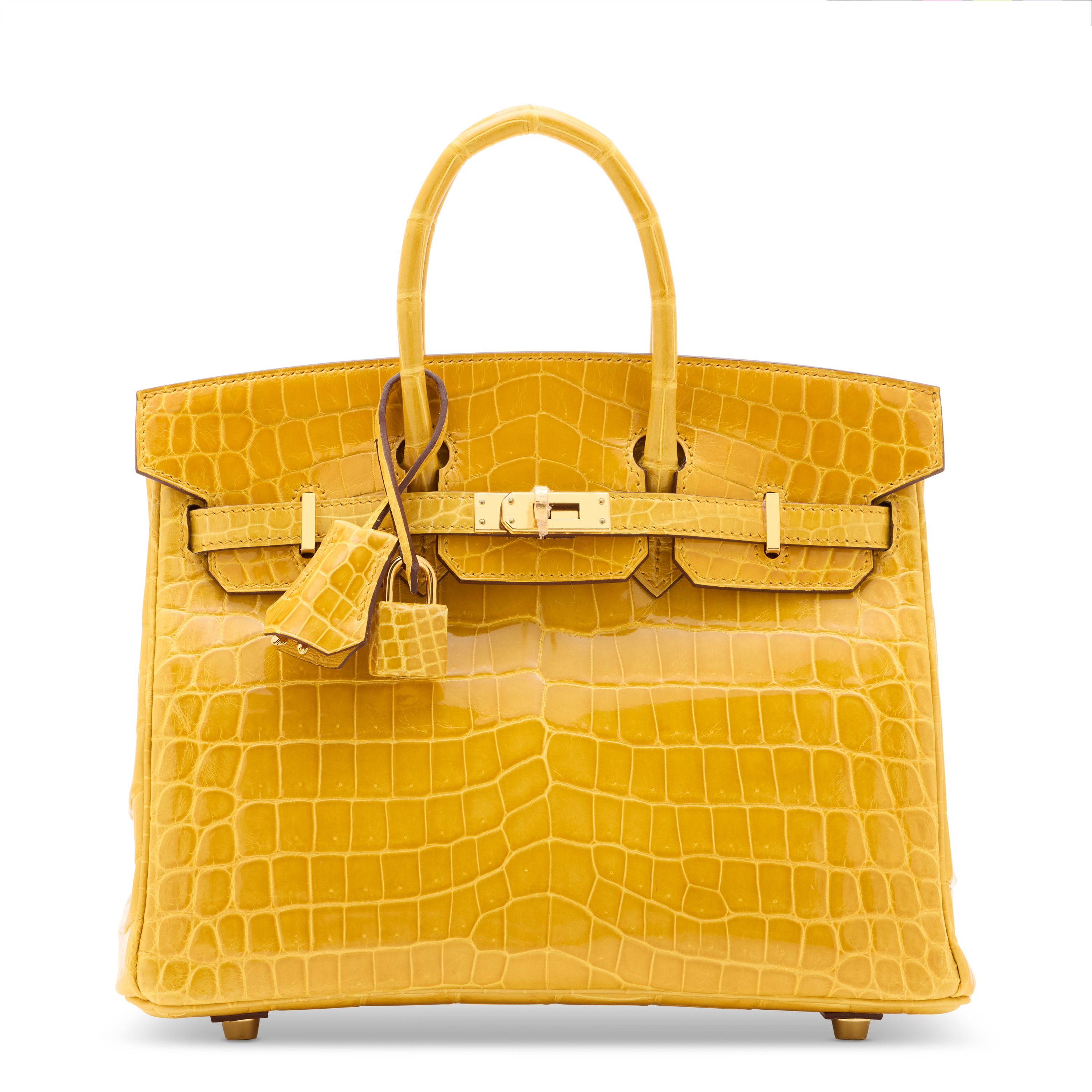 A shiny jaune ambre niloticus crocodile birkin 25 with gold hardware, Hermès, 2019. Estimate: HK$350,000-450,000. Offered in Handbags Online: the Hong Kong edit, until 14 July at Christie’s Online 
