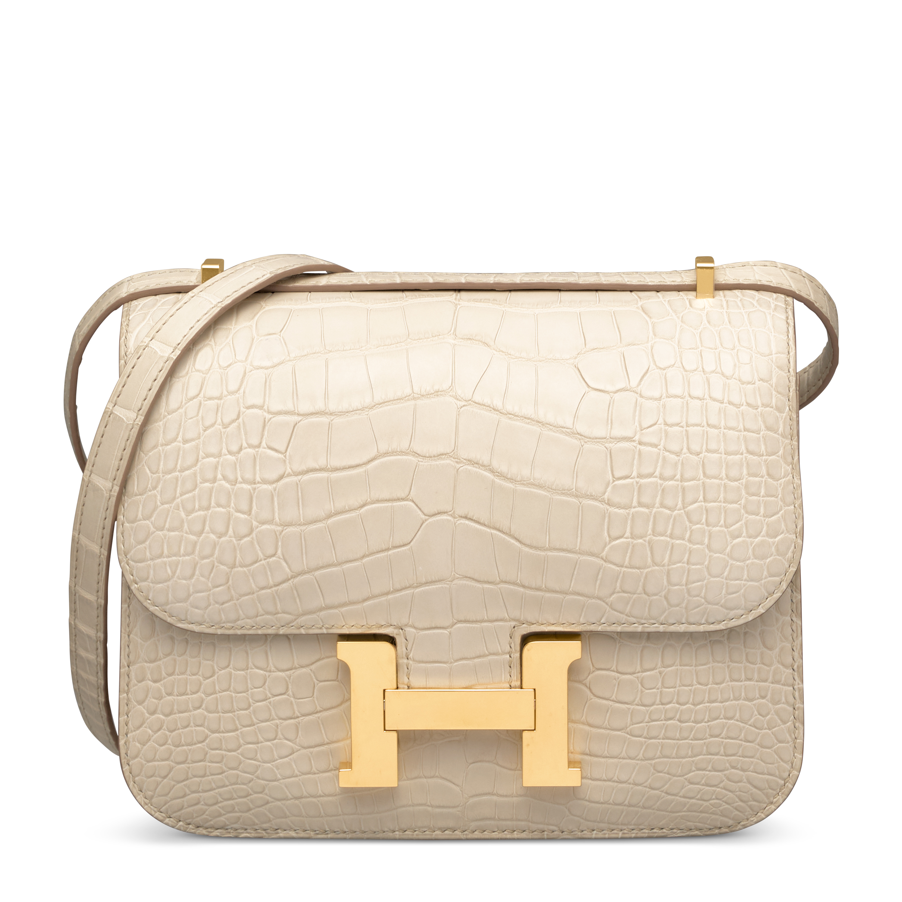 A matte béton alligator mini constance with gold hardware, Hermès, 2021. Estimate: HK$140,000-200,000. Offered in Handbags Online: the Hong Kong edit, until 14 July at Christie’s Online 