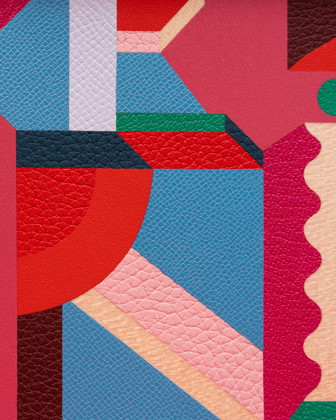 A section of the Perspective Cavaliere pattern of painstakingly cut and inlaid leather pieces on the front panel of the Kellywood 22