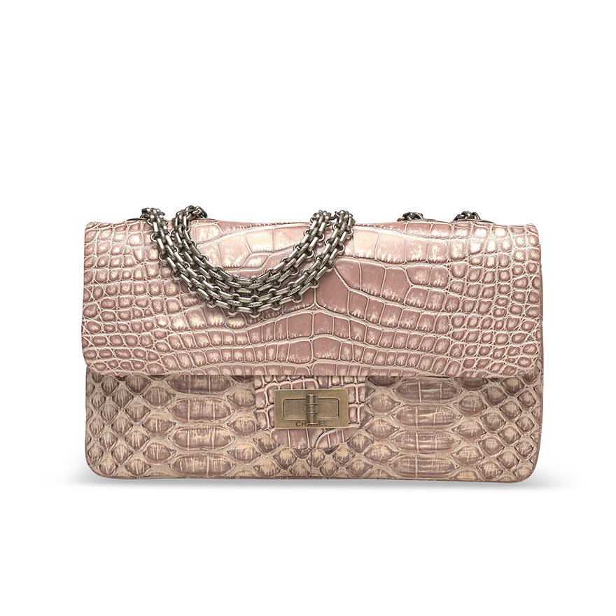 A limited edition matte bronze alligator & python medium 2.55 reissue 225 with antique gold & silver hardware. Chanel, 2009. Sold for HK$163,800 on 15 March 2022 at Christie’s online 