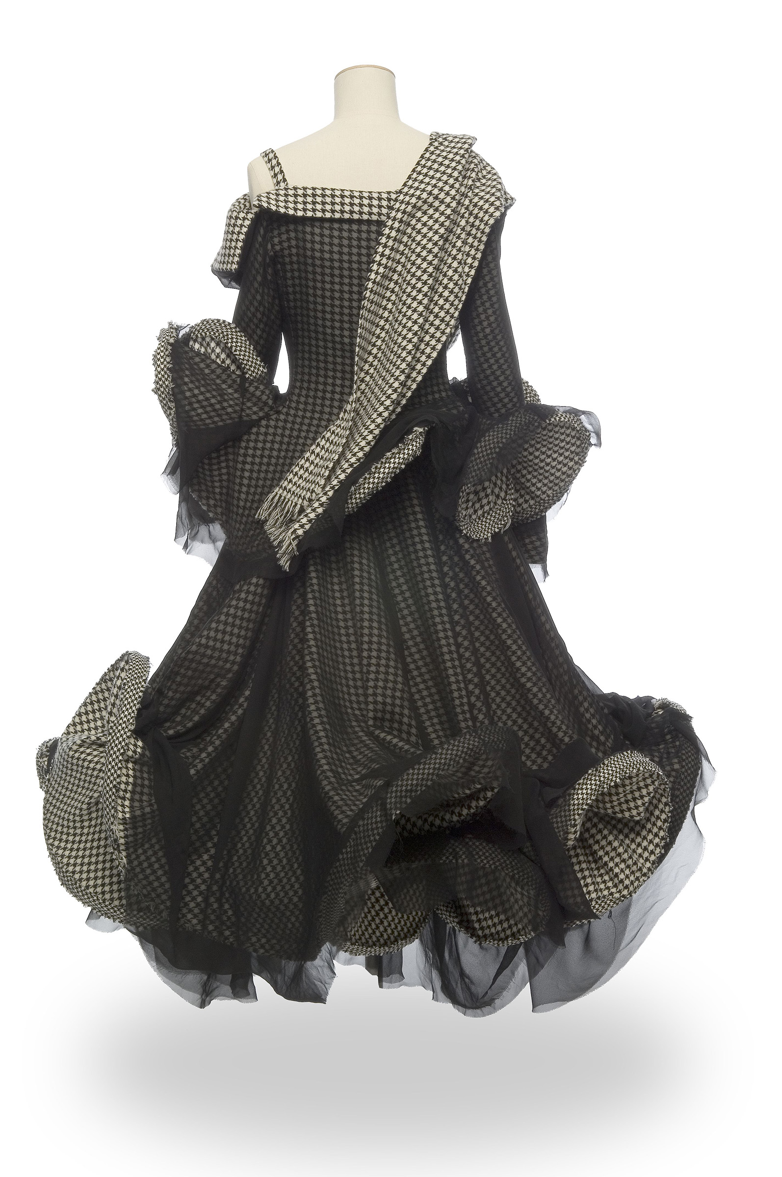 A black chiffon and houndstooth wool skirt designed by Yohji Yamamoto, Autumn/Winter 2003-04, in Look: 40 Years of Fashion at the Museum at the Musee des Arts Decoratifs