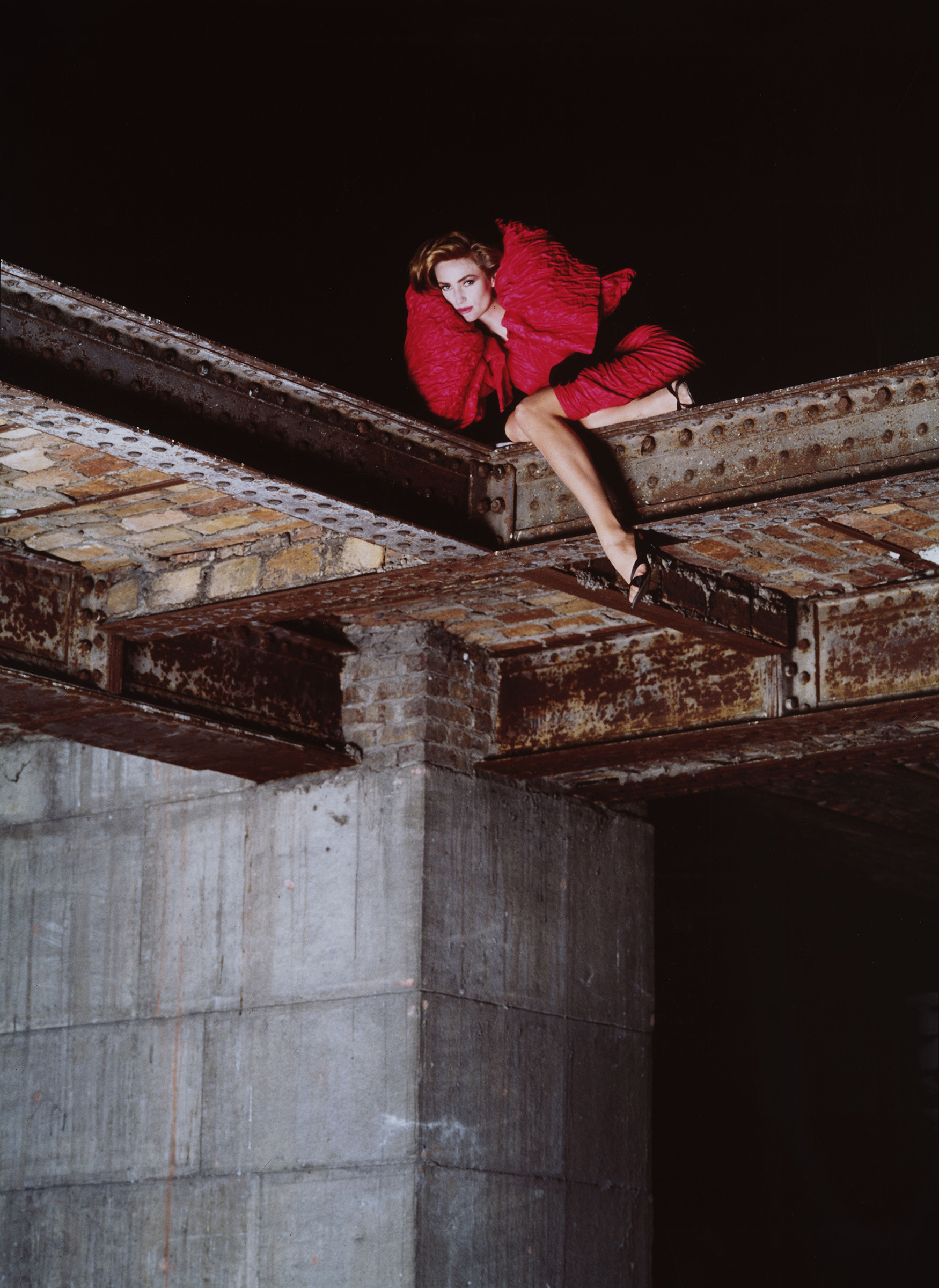 A model wearing a Balenciaga dress in the attic of the Pavillon de Marsan at the Musee des Arts Decoratifs, 1982, by Joe Gaffney, in Look: 40 Years of Fashion at the Museum at the Musee des Arts Decoratifs