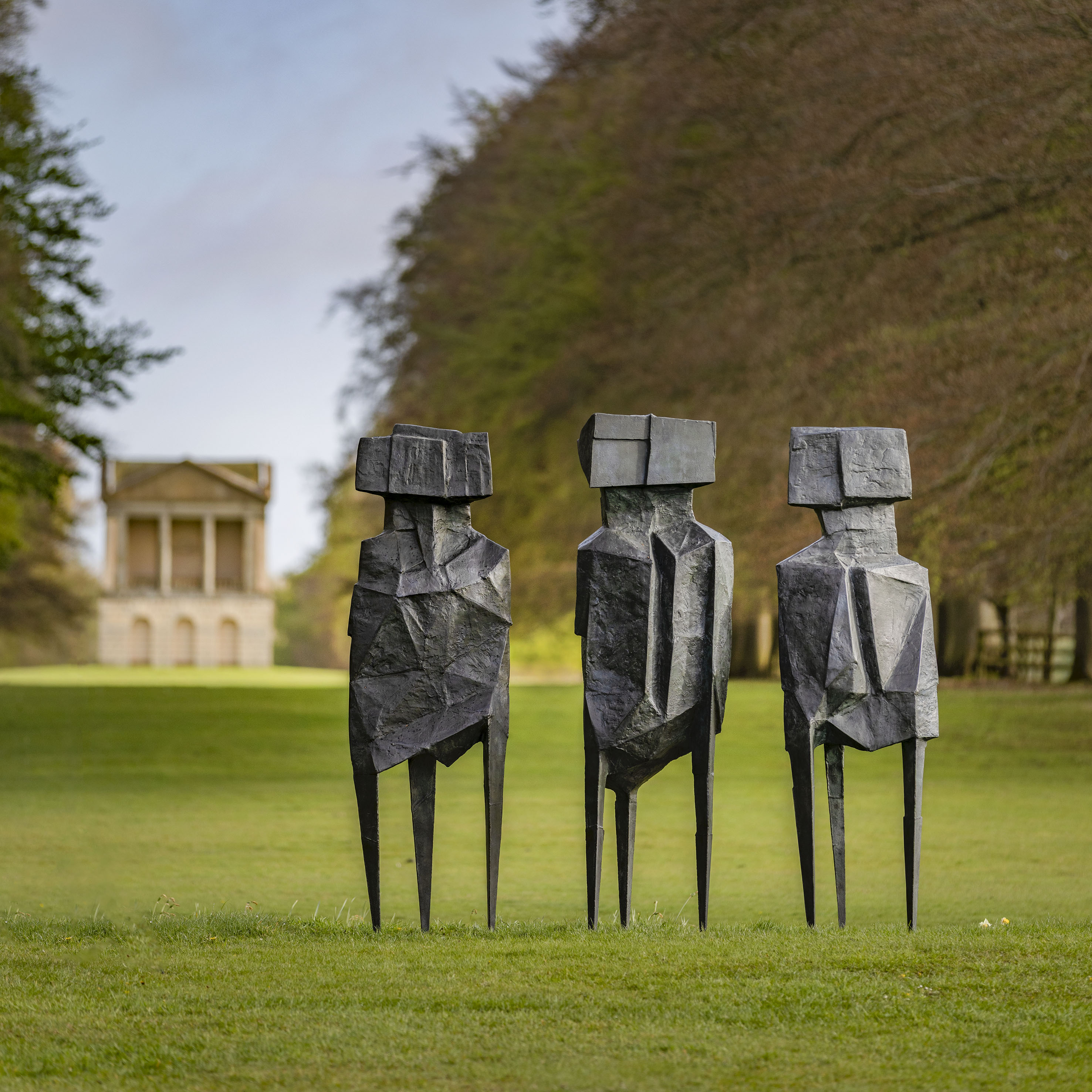 Lynn Chadwick's The Watchers, 1960, in the grounds of Houghton Hall. In the background is the Water House, built in 1731-32 for Sir Robert Walpole and designed by Lord Herbert, 9th Earl of Pembroke, which served as an early domestic water supply and an architectural folly