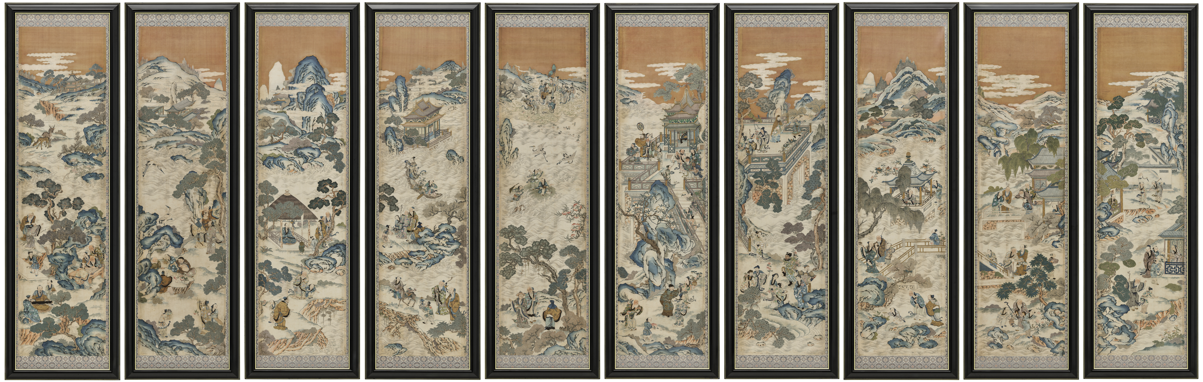 A series of framed traditional Chinese landscape paintings with mountains, buildings, and figures.